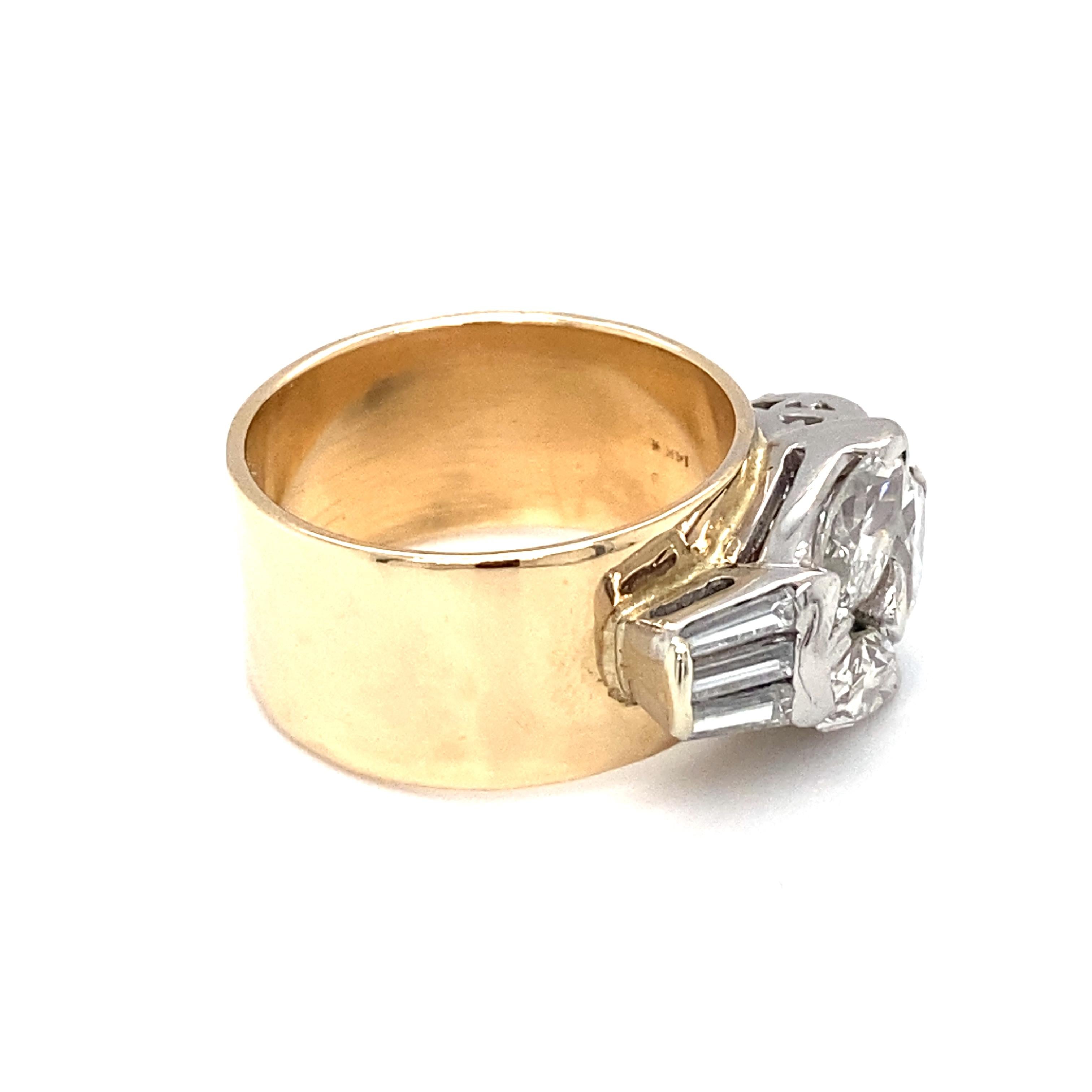 Marquise Cut Circa 1920s 2.32 Carat Diamond Ring in 14 Karat Two Tone Gold