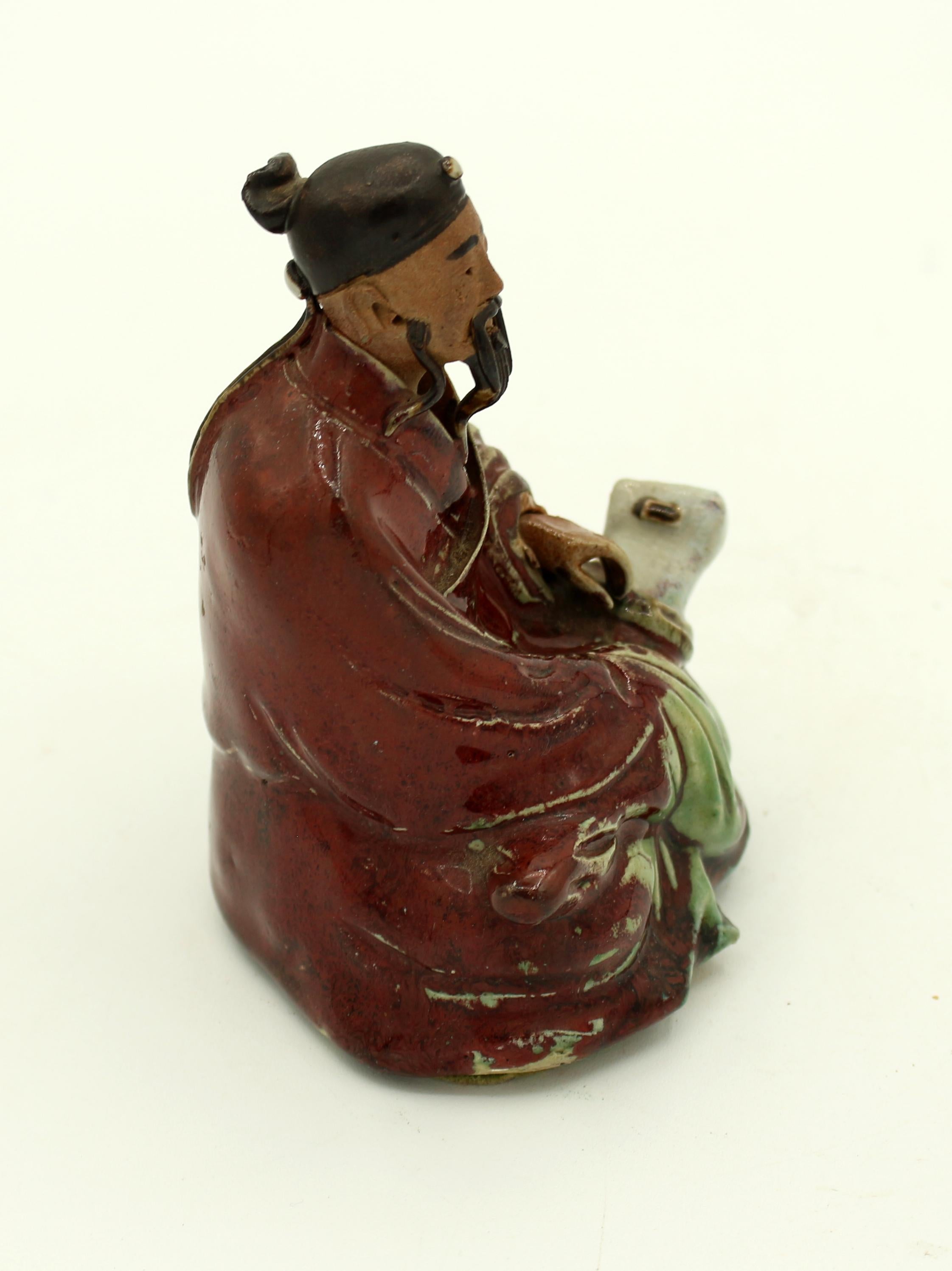 Chinese Circa 1920s-1930s Shiwan Pottery Seated Figure