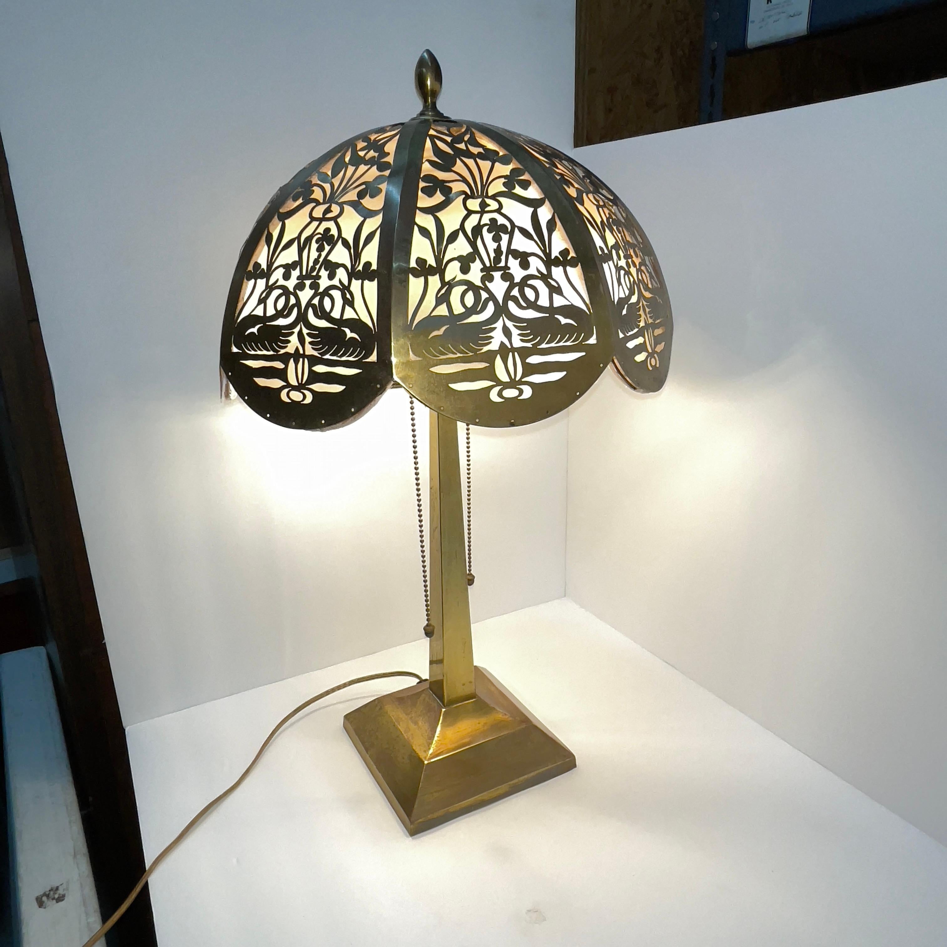 For your consideration is a fantastic brass table lamp with reticulated brass shade. I don’t know about you but, I love pierced metal, ceramic, porcelain- anything pierced that has light shining through it. It may be the shadows it casts on the