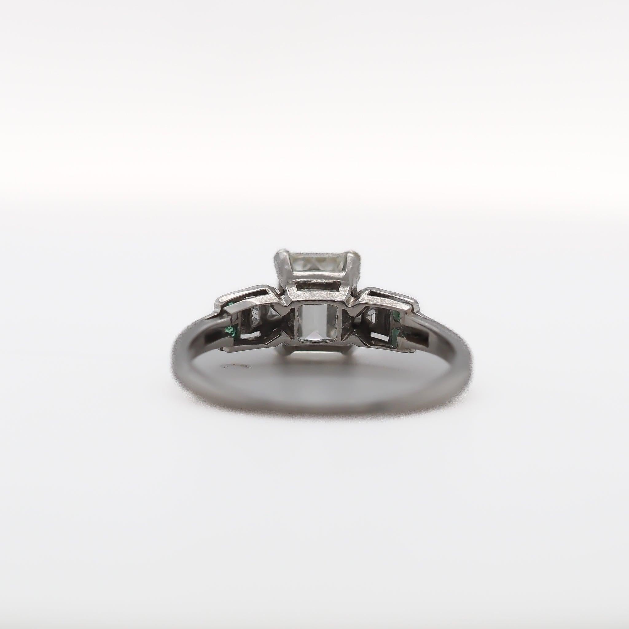 Art Deco Circa 1920s Antique Emerald Diamond and French Cut Diamond Engagement Ring For Sale