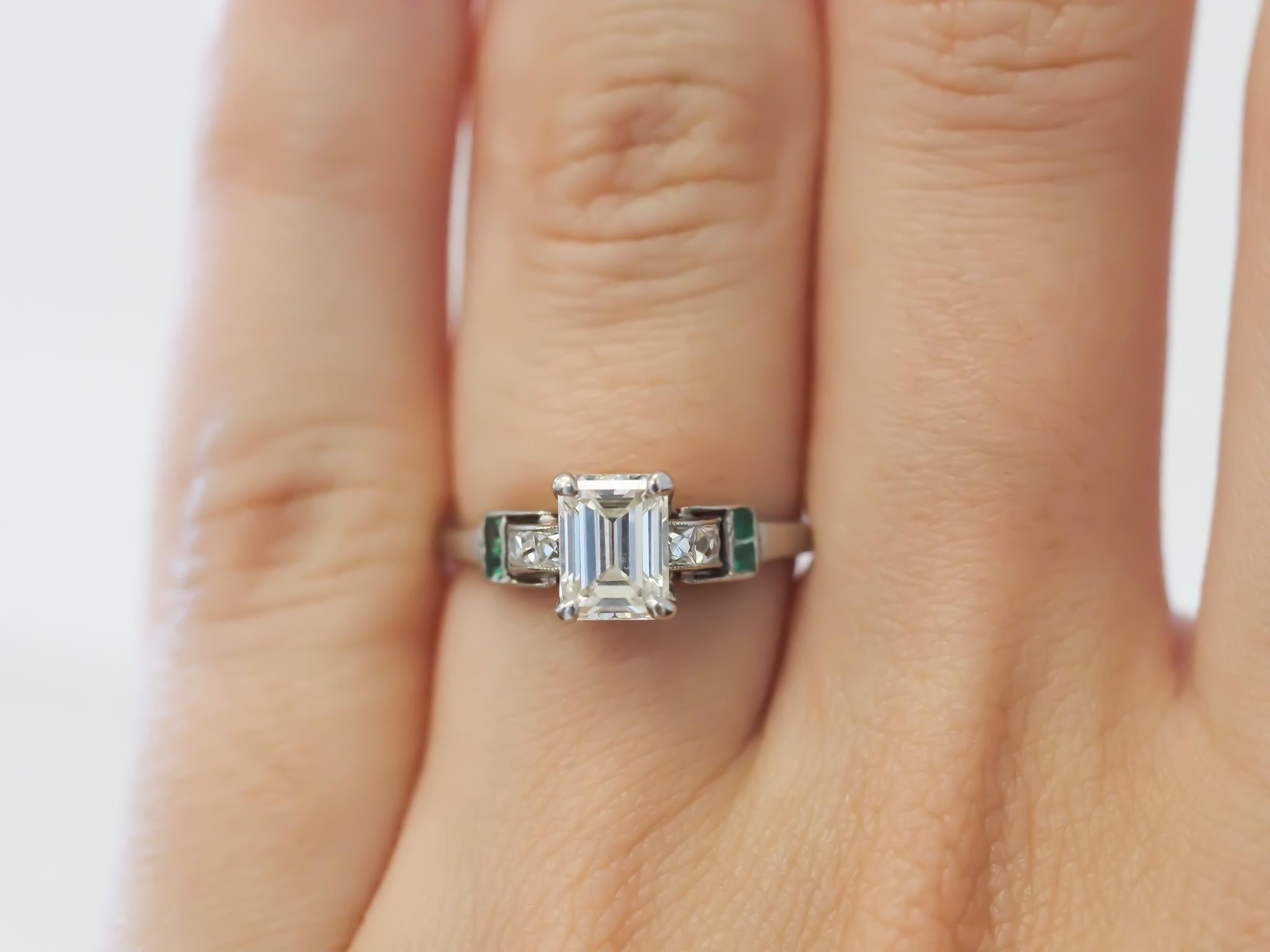 Year: 1920s
Item Details:
Ring Size: 5.75
Metal Type: Platinum [Hallmarked, and Tested]
Weight: 2.6 grams
Center Diamond Details:
Weight: .75ct total weight
Cut: Antique Emerald Cut
Color: F
Clarity: VS
Type: Natural
Finger to Top of Stone
