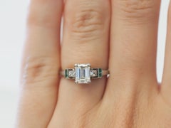 Circa 1920s Antique Emerald Diamond and French Cut Diamond Engagement Ring