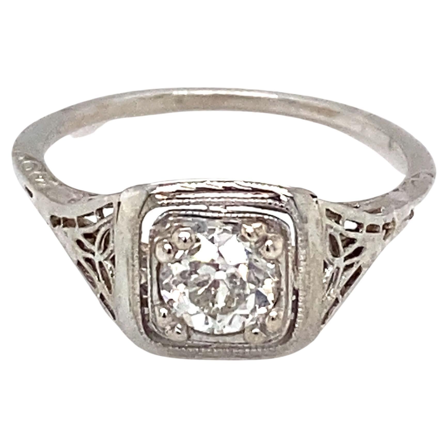 Circa 1920s Art Deco 0.35 Carat Diamond Filigree Ring in 18 Karat White Gold For Sale