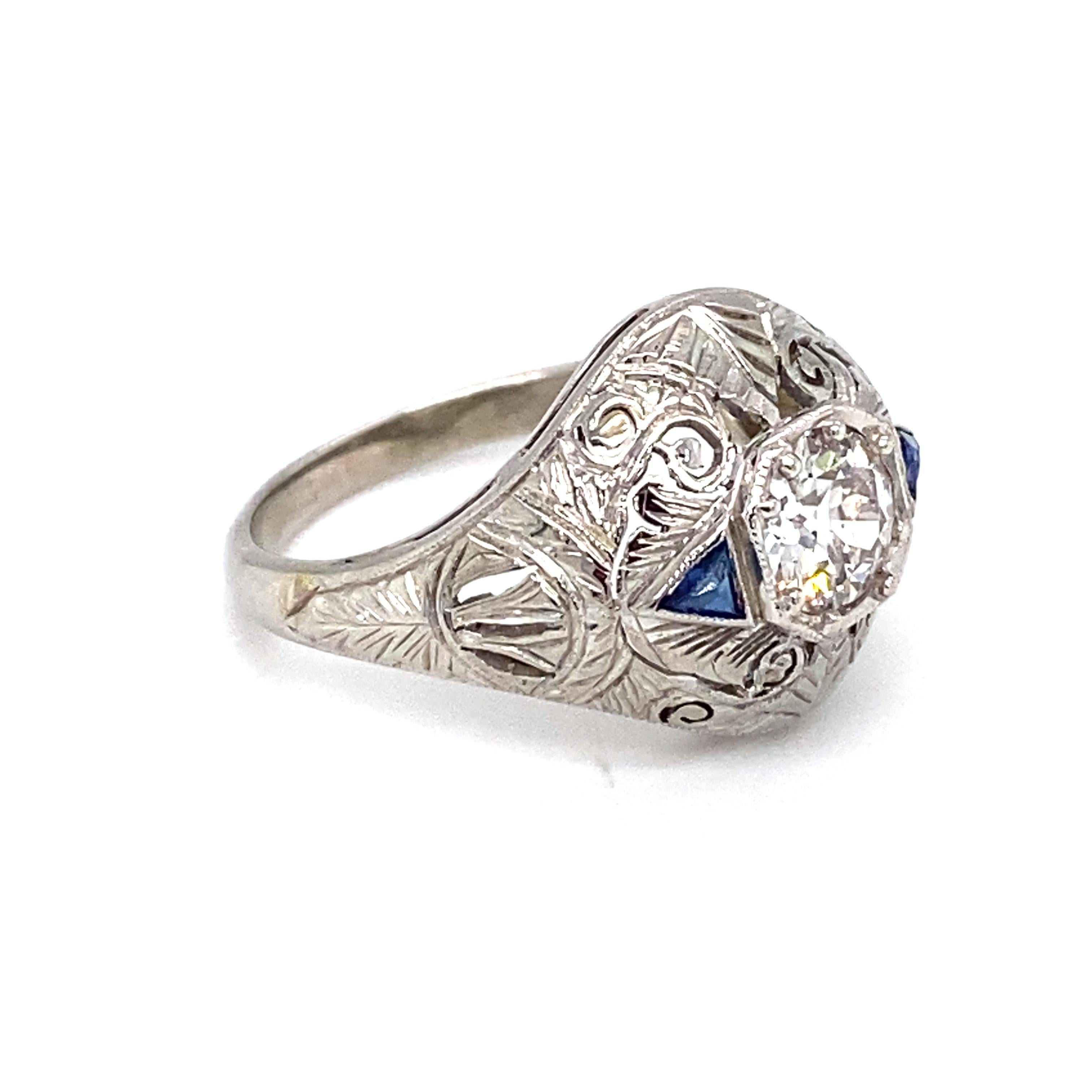 Circa 1920s Art Deco 0.65 Carat Diamond and Sapphire Ring in Platinum In Good Condition For Sale In Atlanta, GA