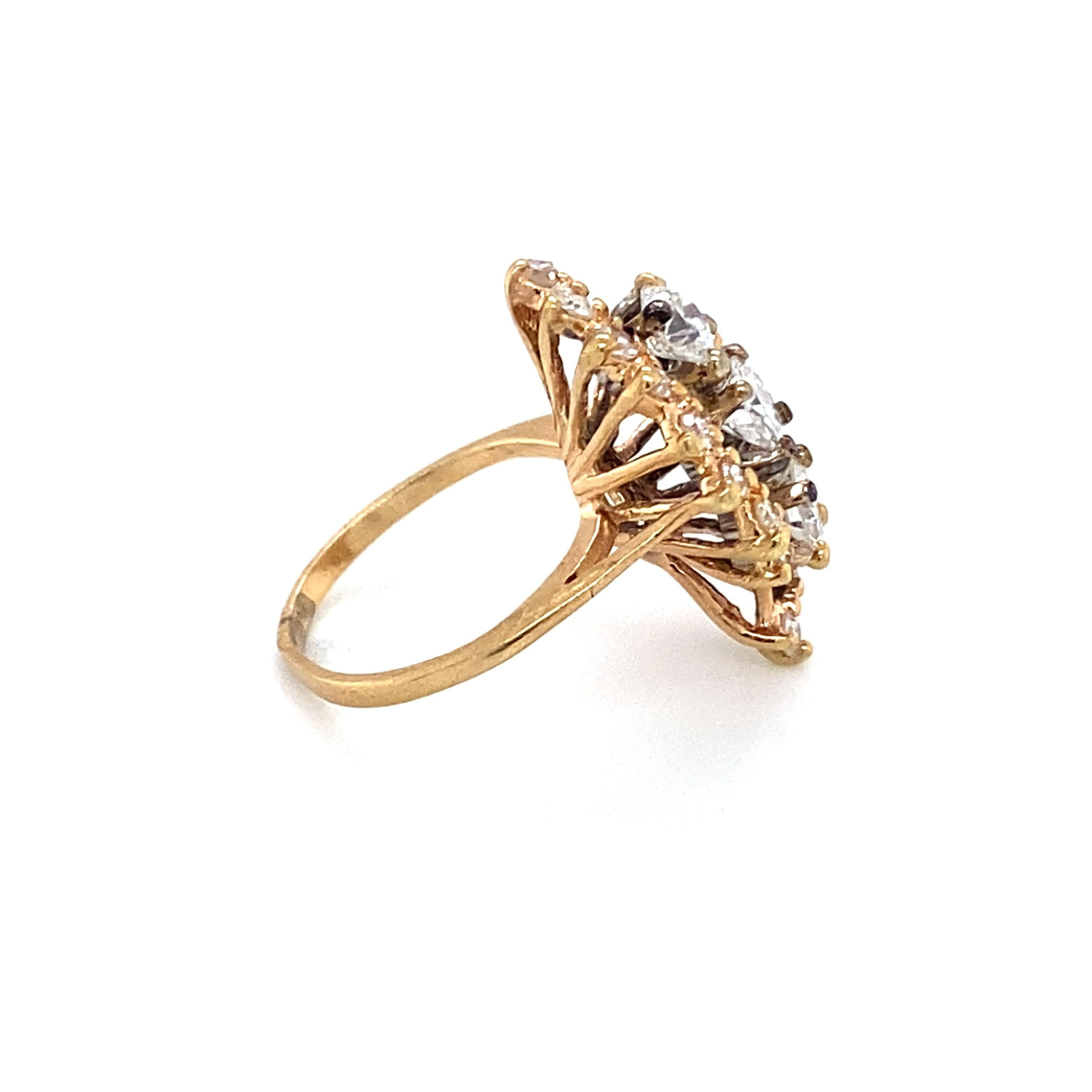 Women's Circa 1920s Art Deco 0.76 Carat Total Diamond Ring in 14 Karat Yellow Gold