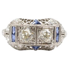 Circa 1920s Art Deco 0.87 Carat Diamond and Sapphire Ring in Platinum
