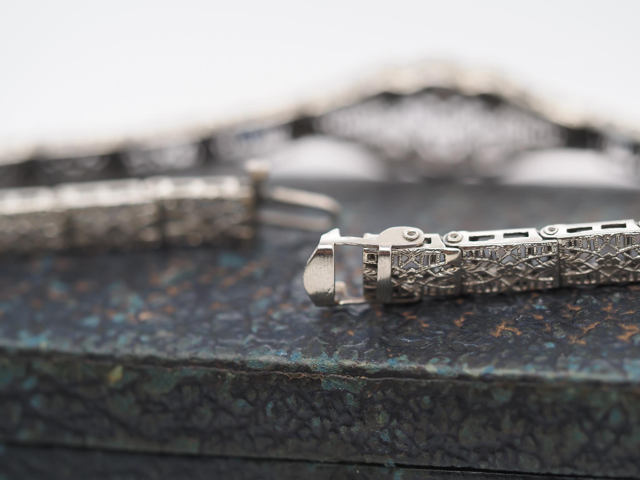Circa 1920s Art Deco 10K White Gold Filigree Diamond Bracelet For Sale 1