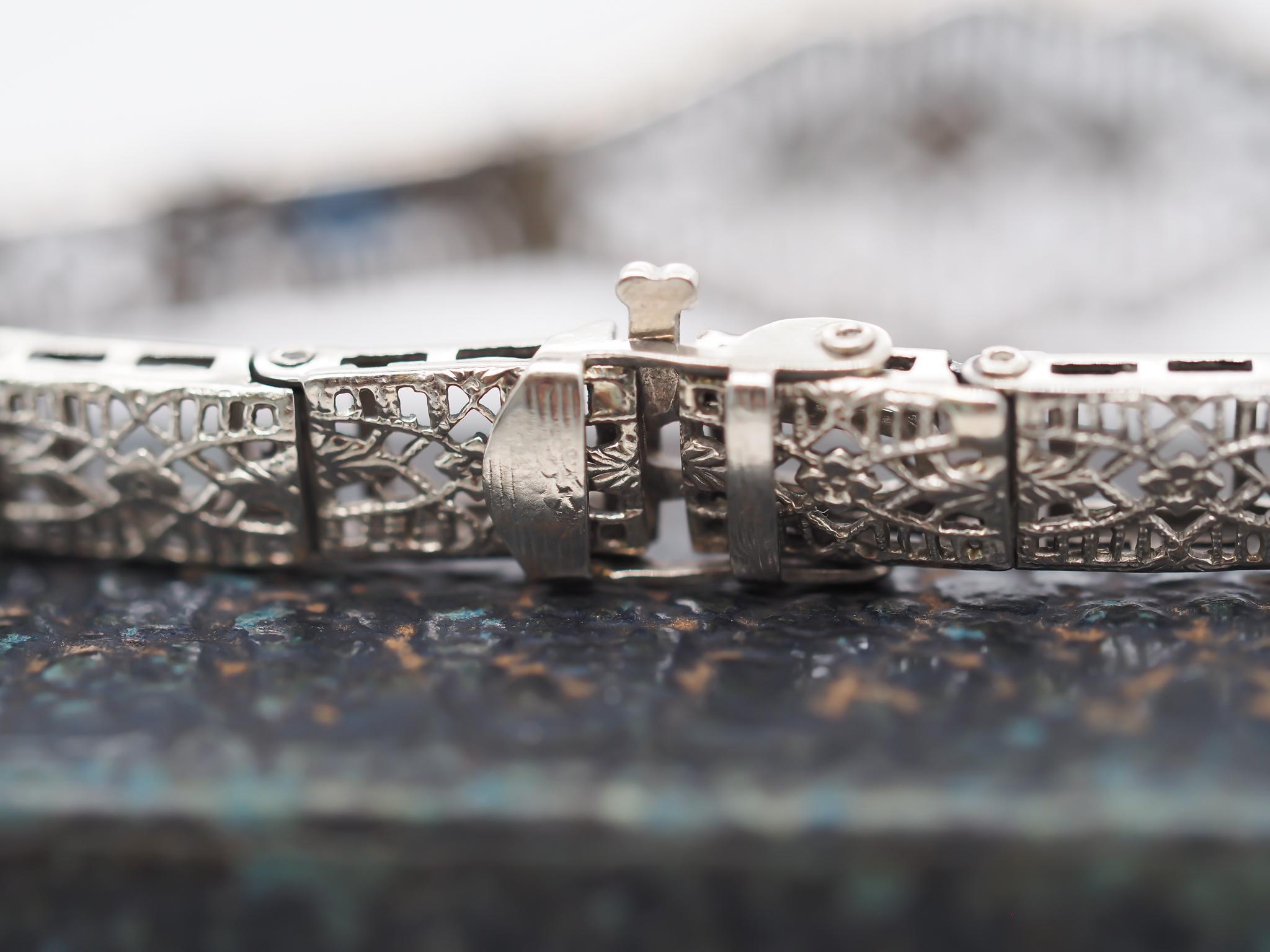 Circa 1920s Art Deco 10K White Gold Filigree Diamond Bracelet For Sale 3