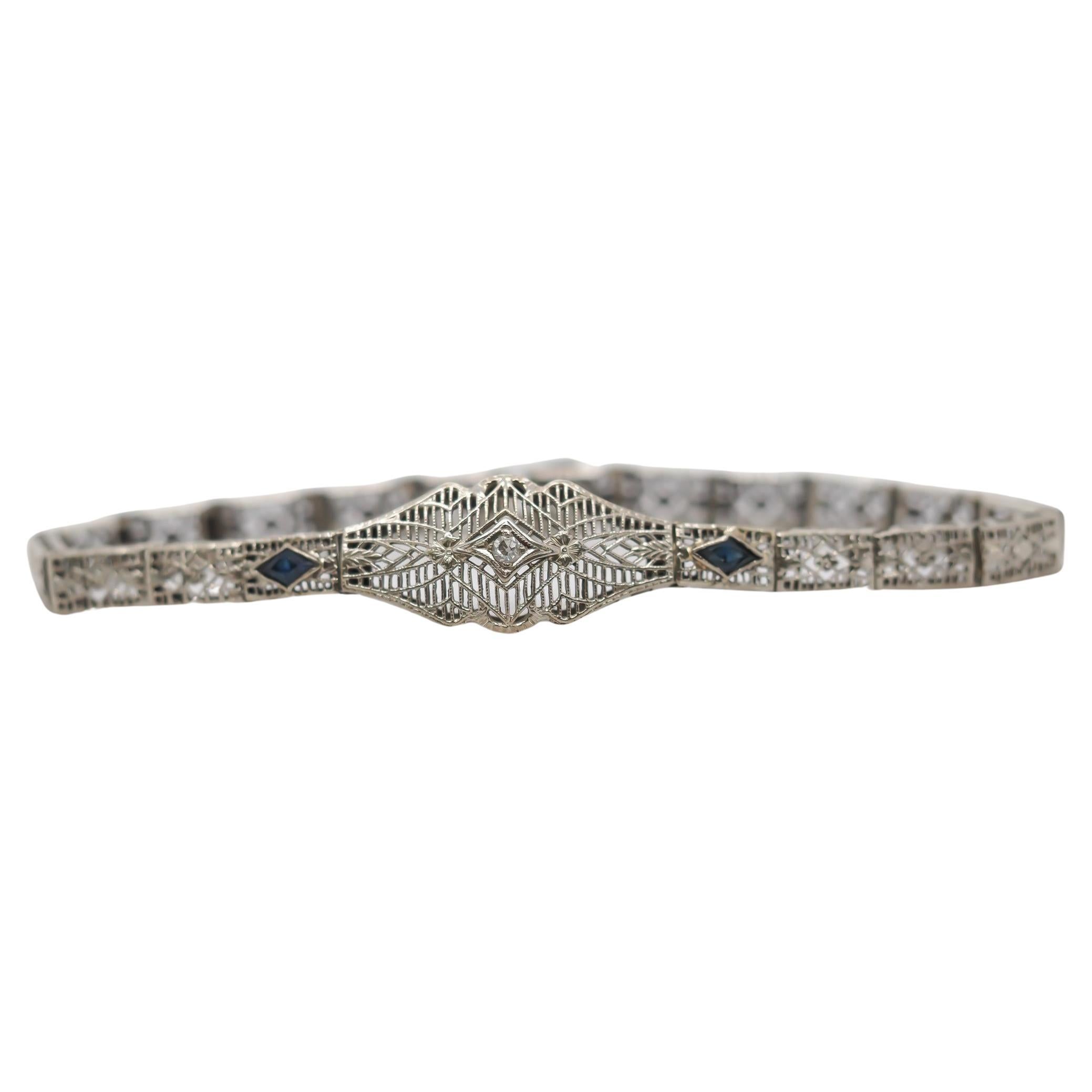 Circa 1920s Art Deco 10K White Gold Filigree Diamond Bracelet