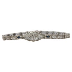Circa 1920s Art Deco 10K White Gold Filigree Diamond Bracelet
