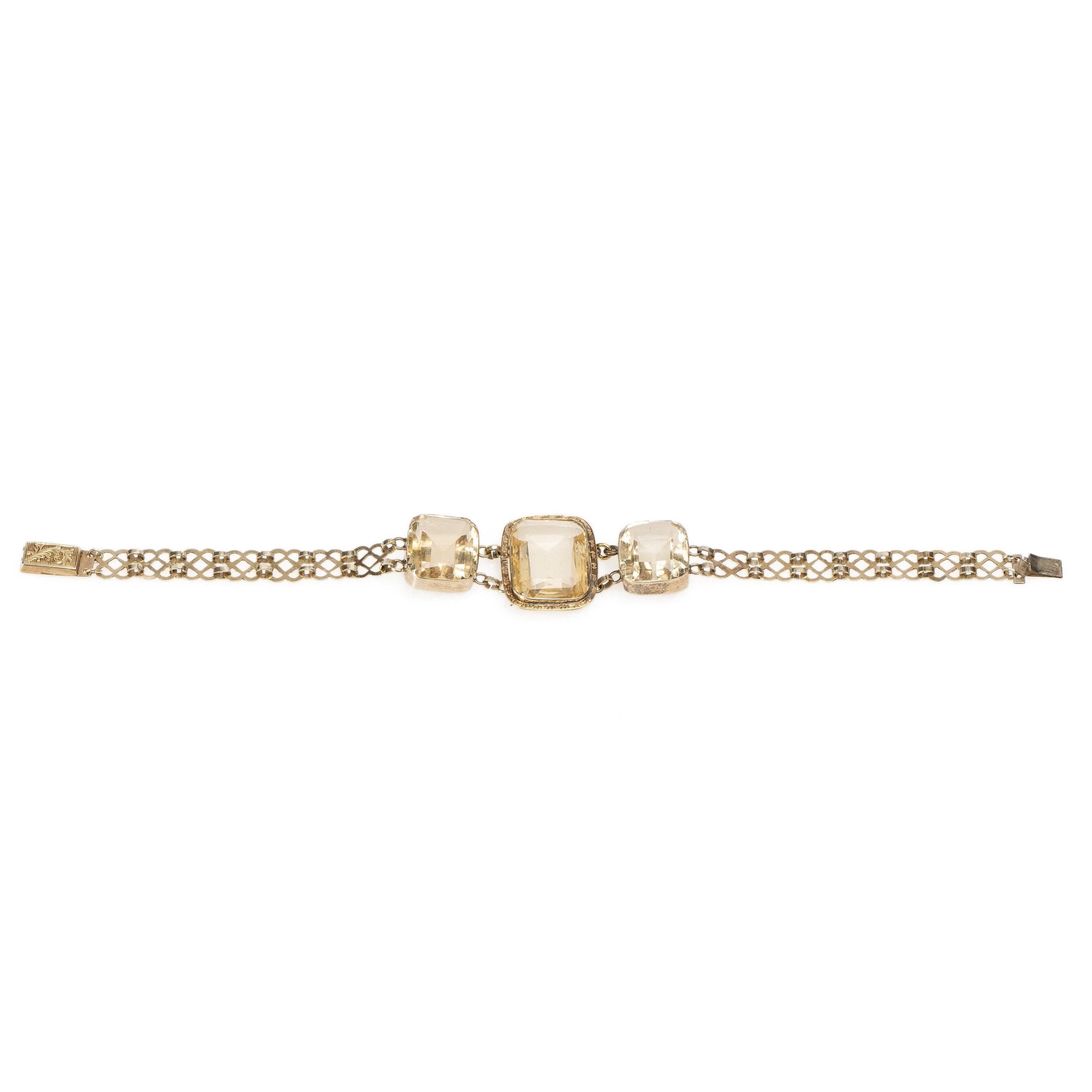 Here we have a simple and elegant statement bracelet. Crafted in 10K yellow gold this art deco ring has beautiful muted color, that gives ,some extra sparkle without being over the top. The lattice style links are the perfect compliment to the big