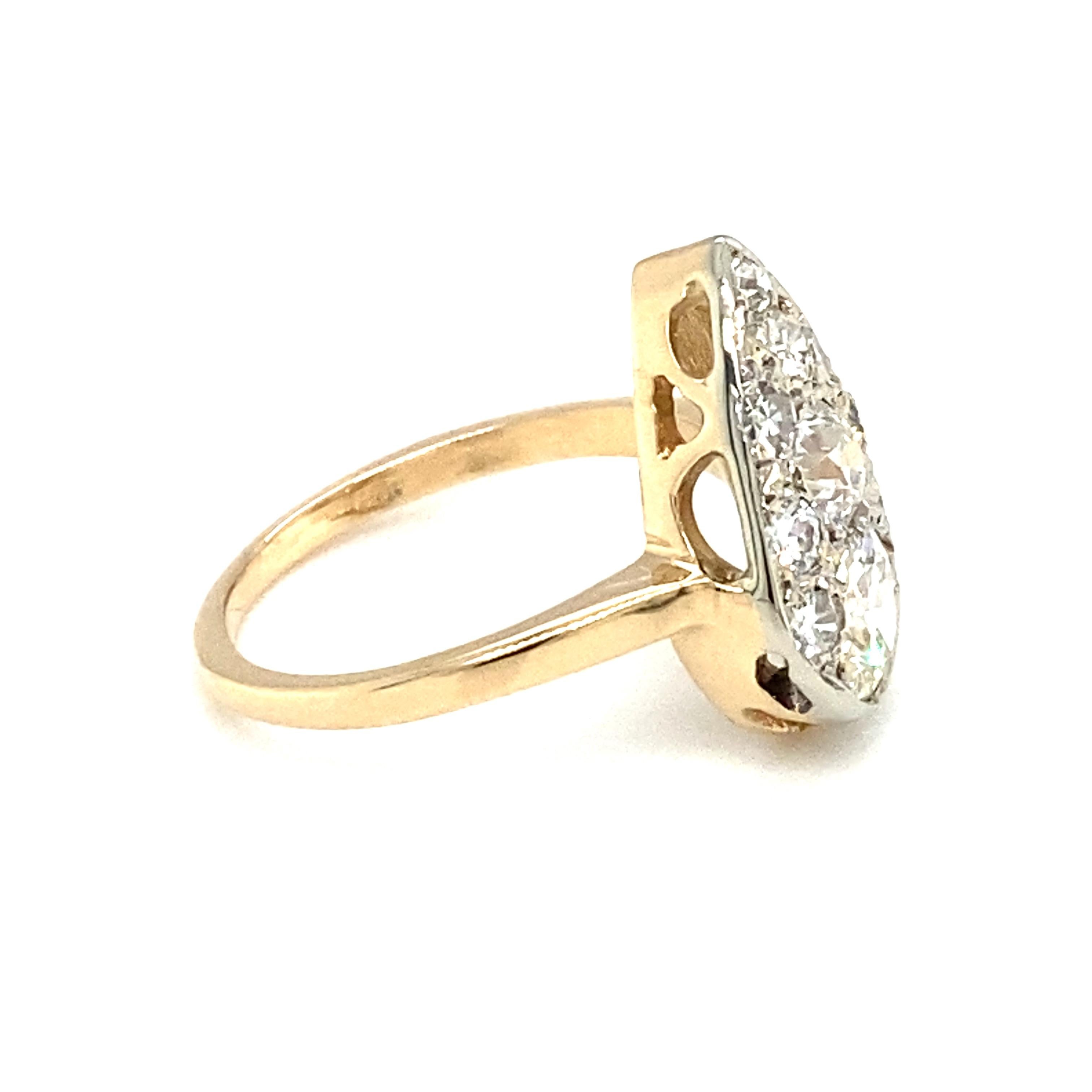 Item Details: This Art Deco ring has a cluster of old European cut diamonds in a pear shape. 
The cluster of diamonds can resemble a 3.0 carat diamond.

Circa: 1920s
Metal Type: 14 Karat Yellow Gold
Weight: 2.8 grams
Size: US 5, resizable

Diamond