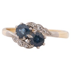 Circa 1920's Art Deco 18K Two Tone Vintage Bypass Sapphire Fashion Ring