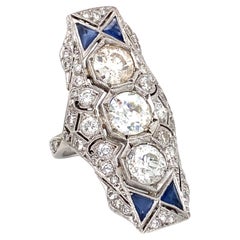 Circa 1920s Art Deco 5.5 Carat Diamond and Sapphire Shield Ring in Platinum
