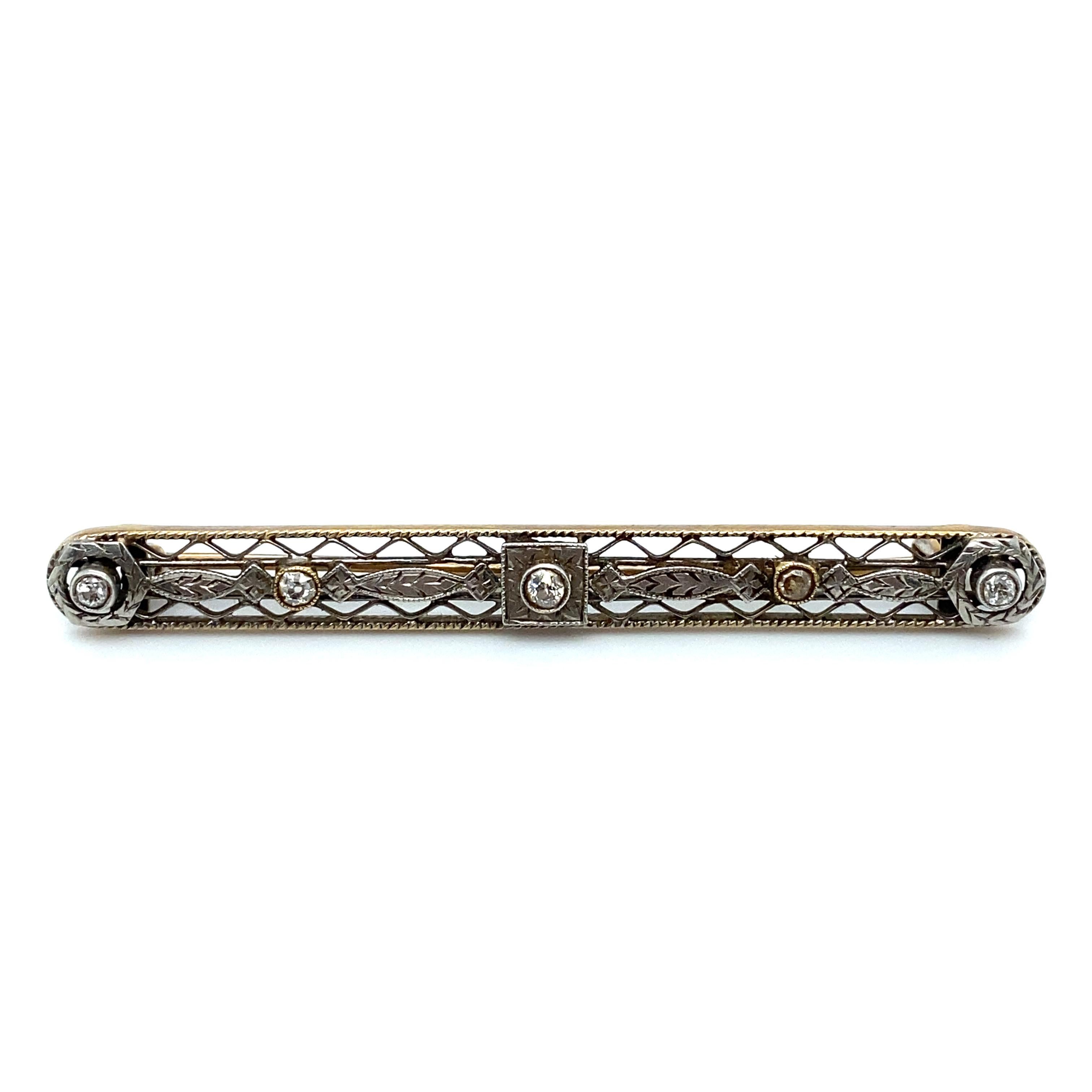 Item Details: This bar brooch from the 1920s has a classic Art Deco design with accent Old European cut diamonds. 

Circa: 1920s
Metal Type:  14 karat white gold
Weight: 4.6 grams
Size: 2.25 inch width 

Diamond Details:

Carat: Approximately 0.25