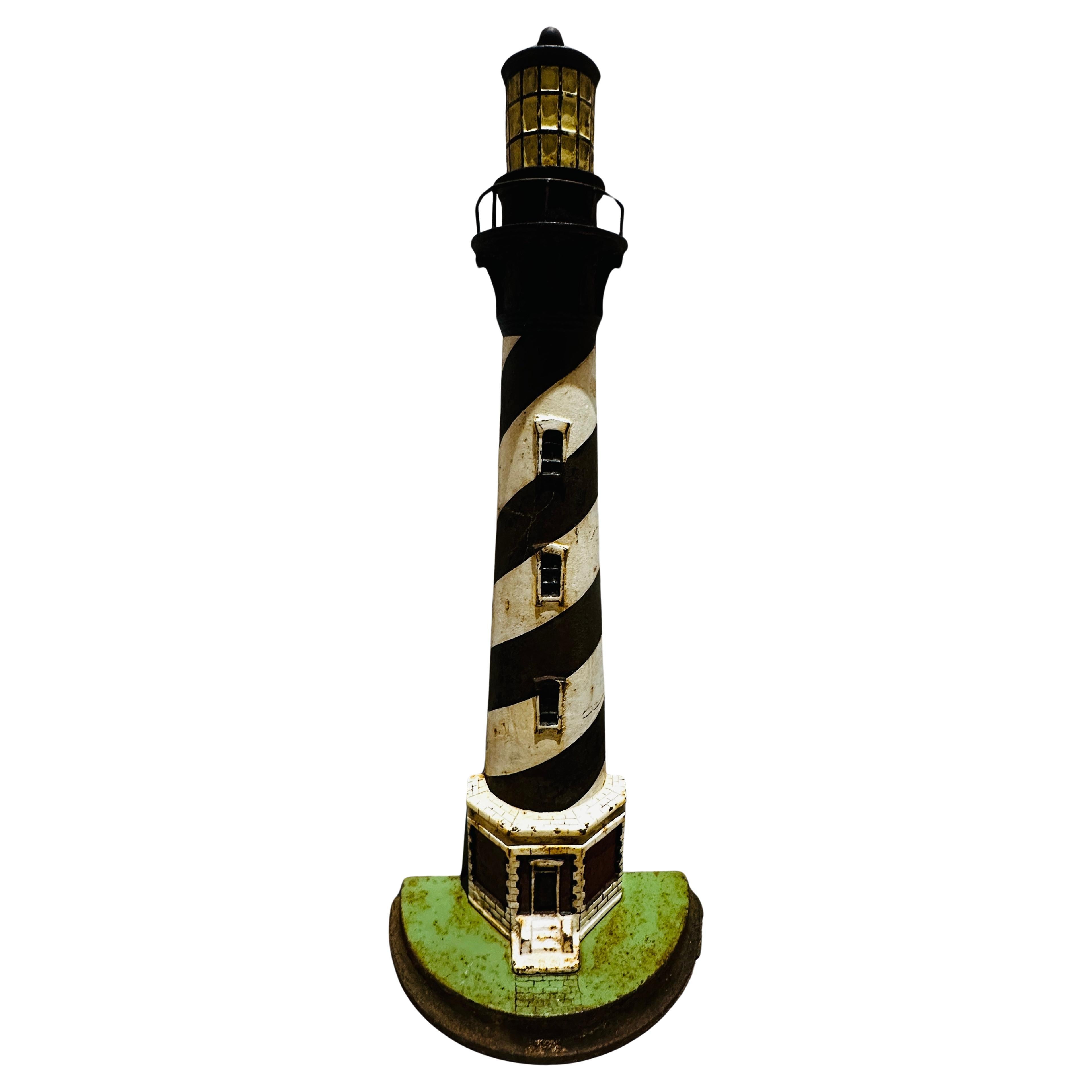 Circa 1920s Art Deco Cape Hatteras North Carolina Lighthouse Cast Iron Doorstop For Sale