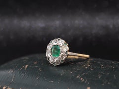 Circa 1920s Art Deco Emerald and Old European Diamond Ring