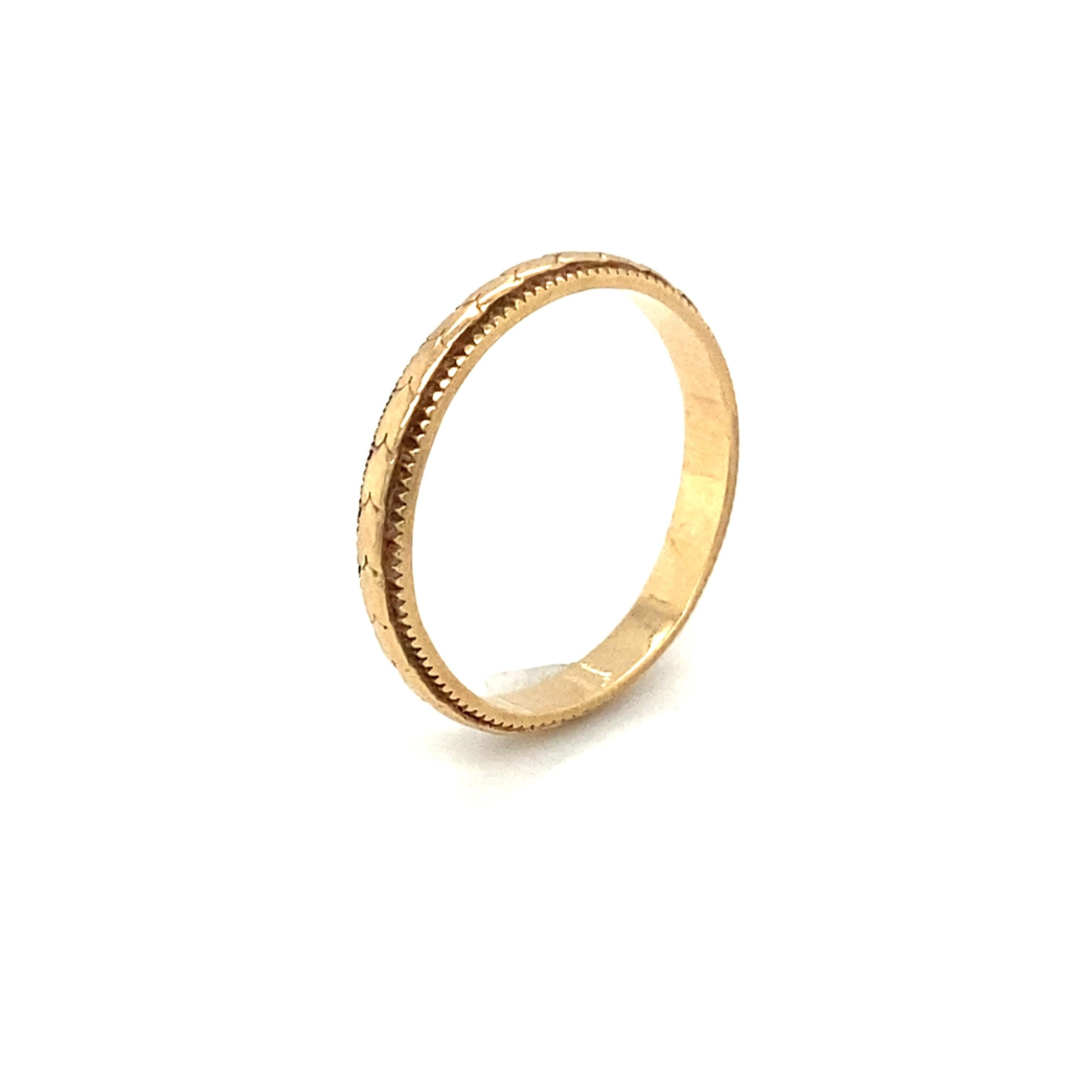 Item Details:
Metal type: 14 Karat Yellow Gold 
Weight: 1.7 grams 
Size: 5 (resizable)
Hallmarked 14K

Item Features:
This elegant yet simple Art Deco band ring was made in the 1920s. This ring is very well made and in great condition with beautiful