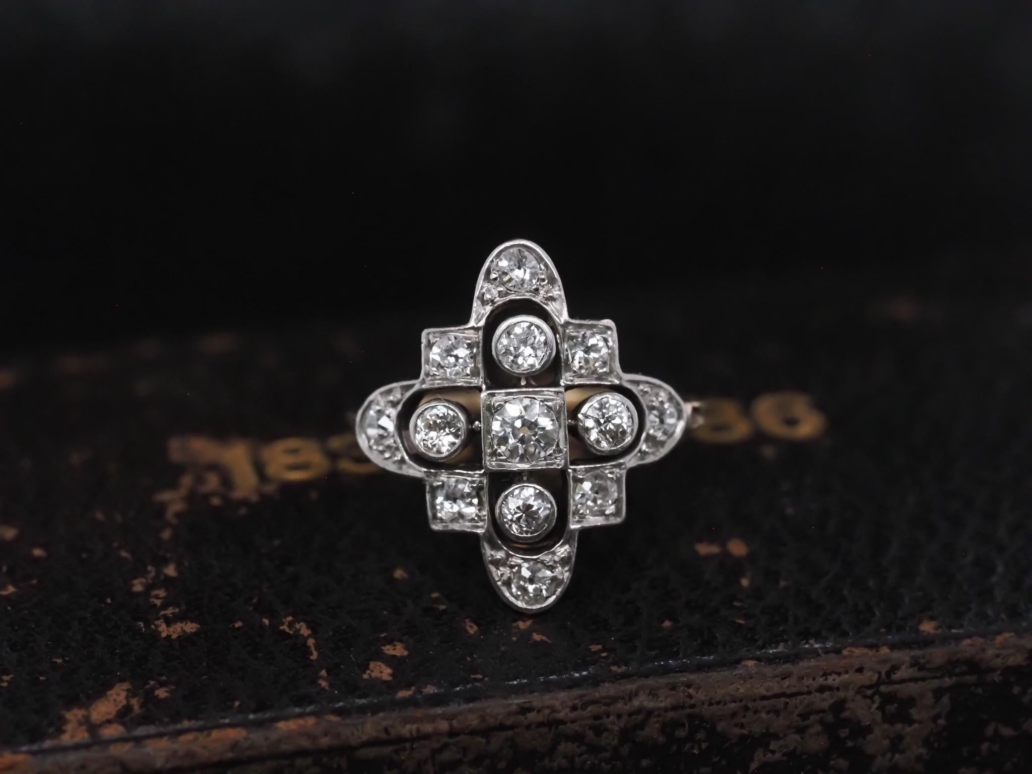 Year: 1920s

Item Details:
Ring Size: 5.75 (Sizable)
Metal Type: 14K Yellow Gold and Platinum Top [Hallmarked, and Tested]
Weight: 3.4 grams

Diamond Details: Old European Brilliant, .75ct total weight, G Color, VS Clarity.

Band Width: