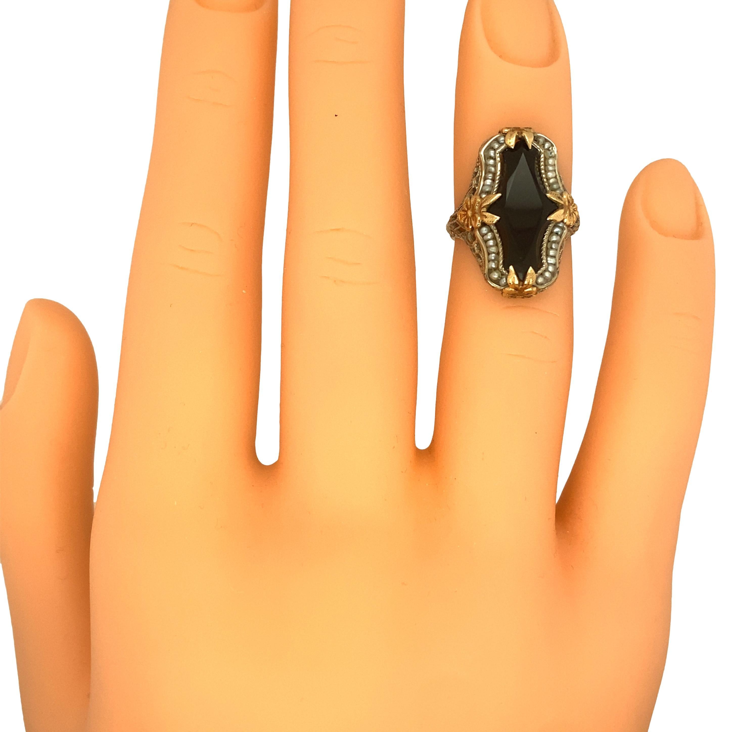 Circa 1920s Art Deco Onyx and Pearl Ring in Two Tone 14K Gold For Sale 1