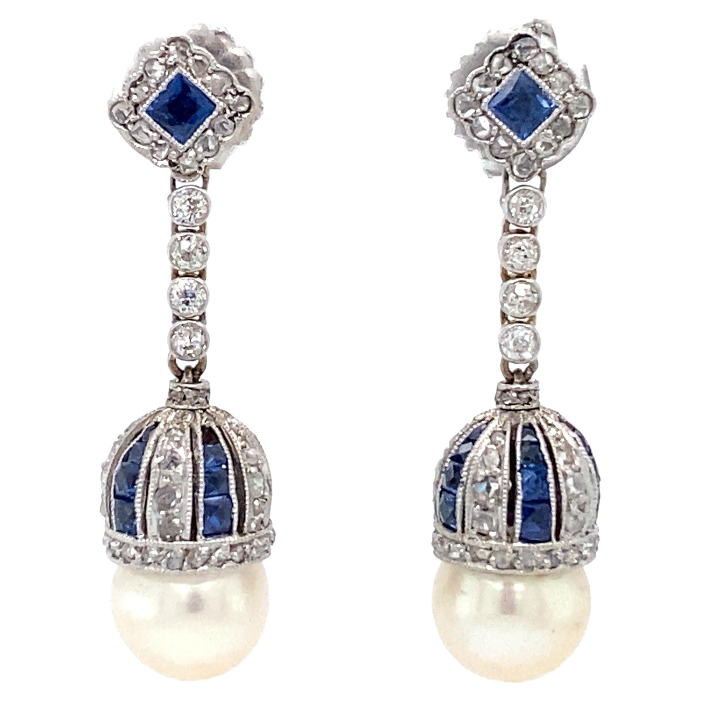 Circa 1920s Art Deco Pearl, Diamond and Sapphire Dangle Earrings in Platinum