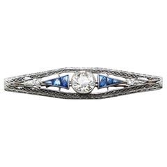 Circa 1920s Art Deco Platinum 1.75ct Old Mine Diamond and French Cut Sapphire