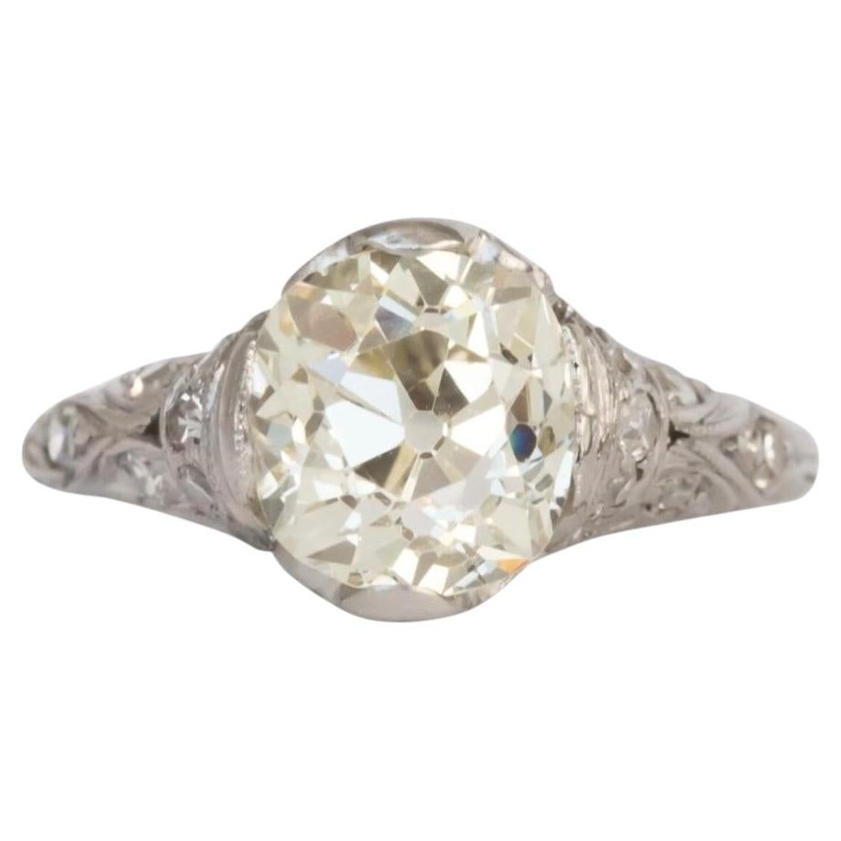 Circa 1920s Art Deco Platinum 2.20ct Antique Cushion Diamond Engagement Ring For Sale