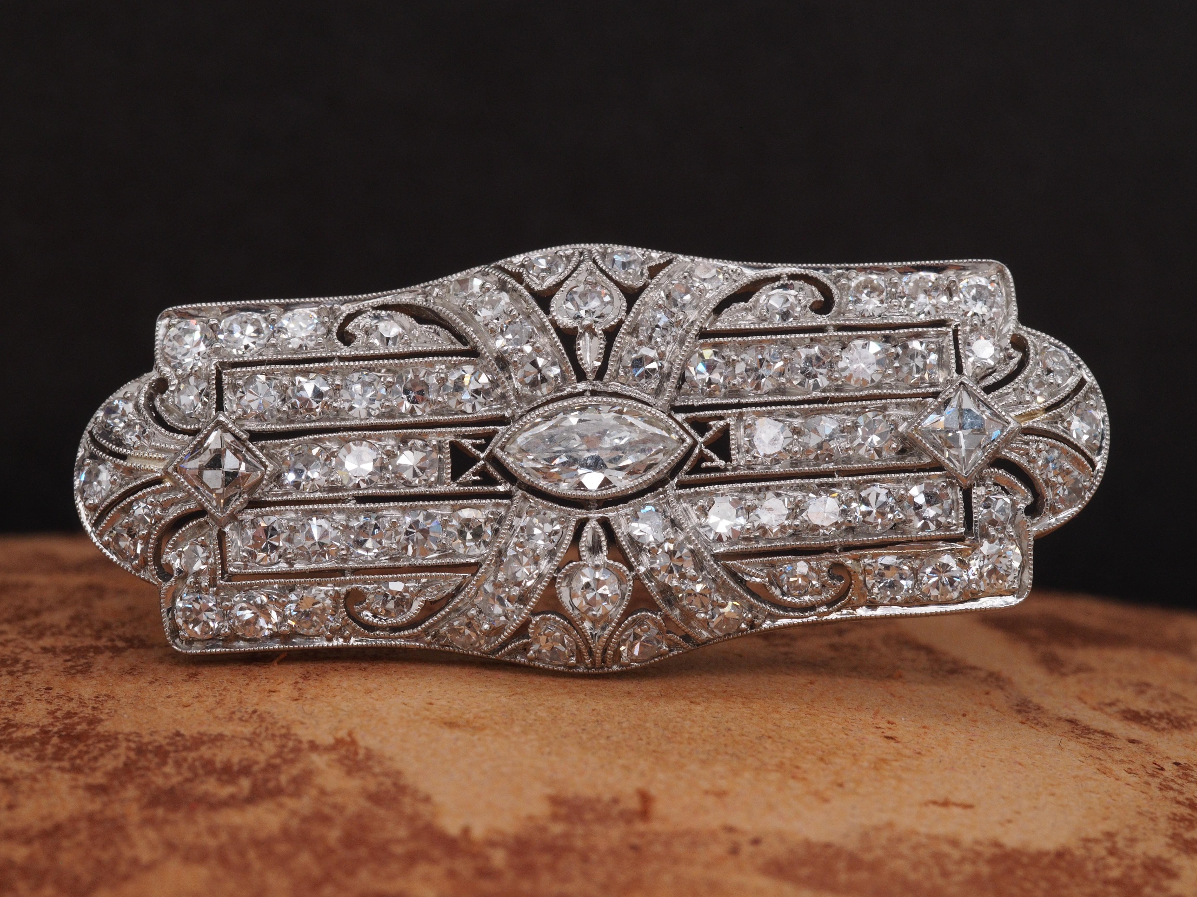 Marquise Cut Circa 1920s Art Deco Platinum 2.50cttw Antique Marquise & French Cut Diamond Pin For Sale