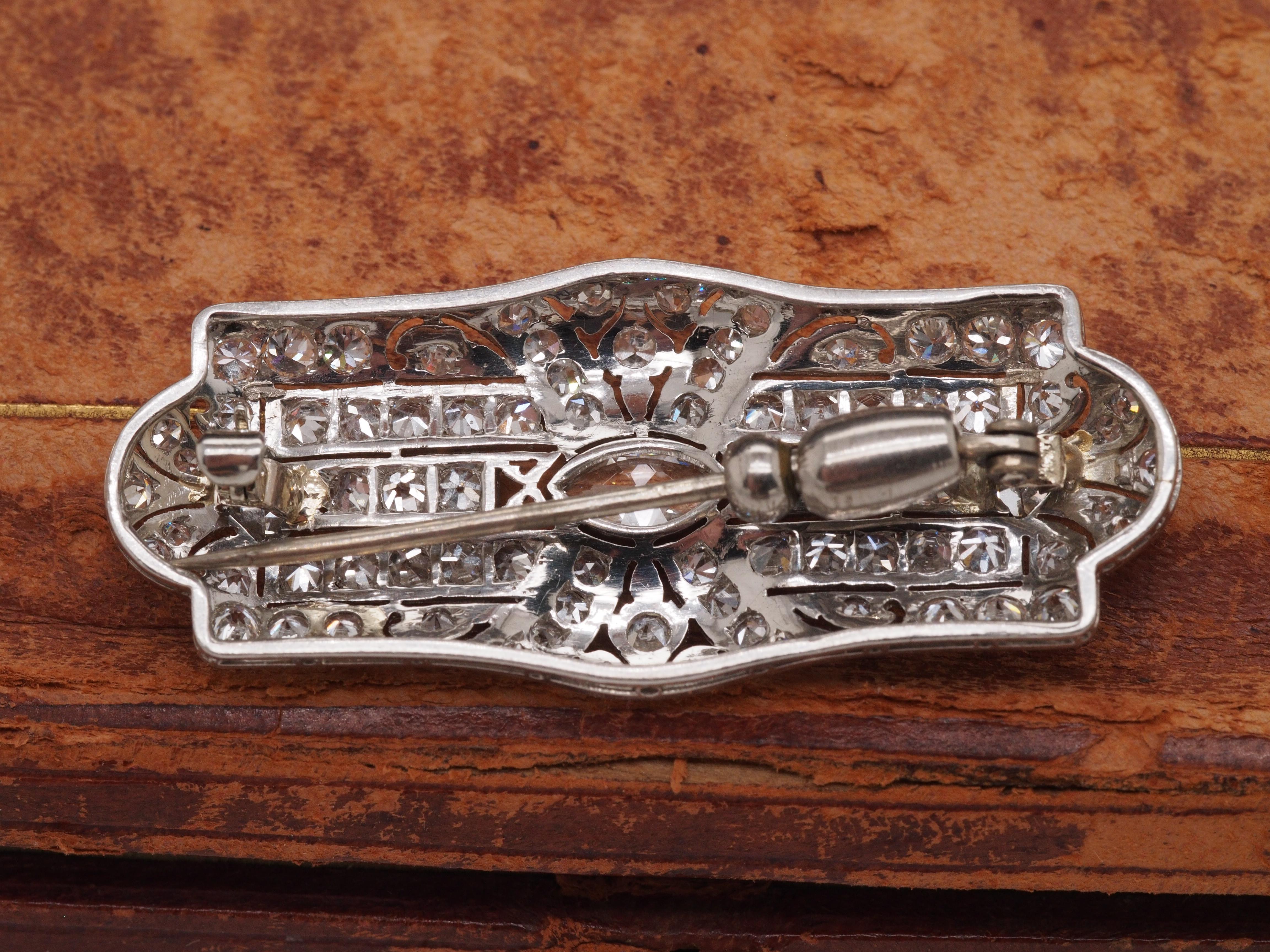 Women's Circa 1920s Art Deco Platinum 2.50cttw Antique Marquise & French Cut Diamond Pin For Sale