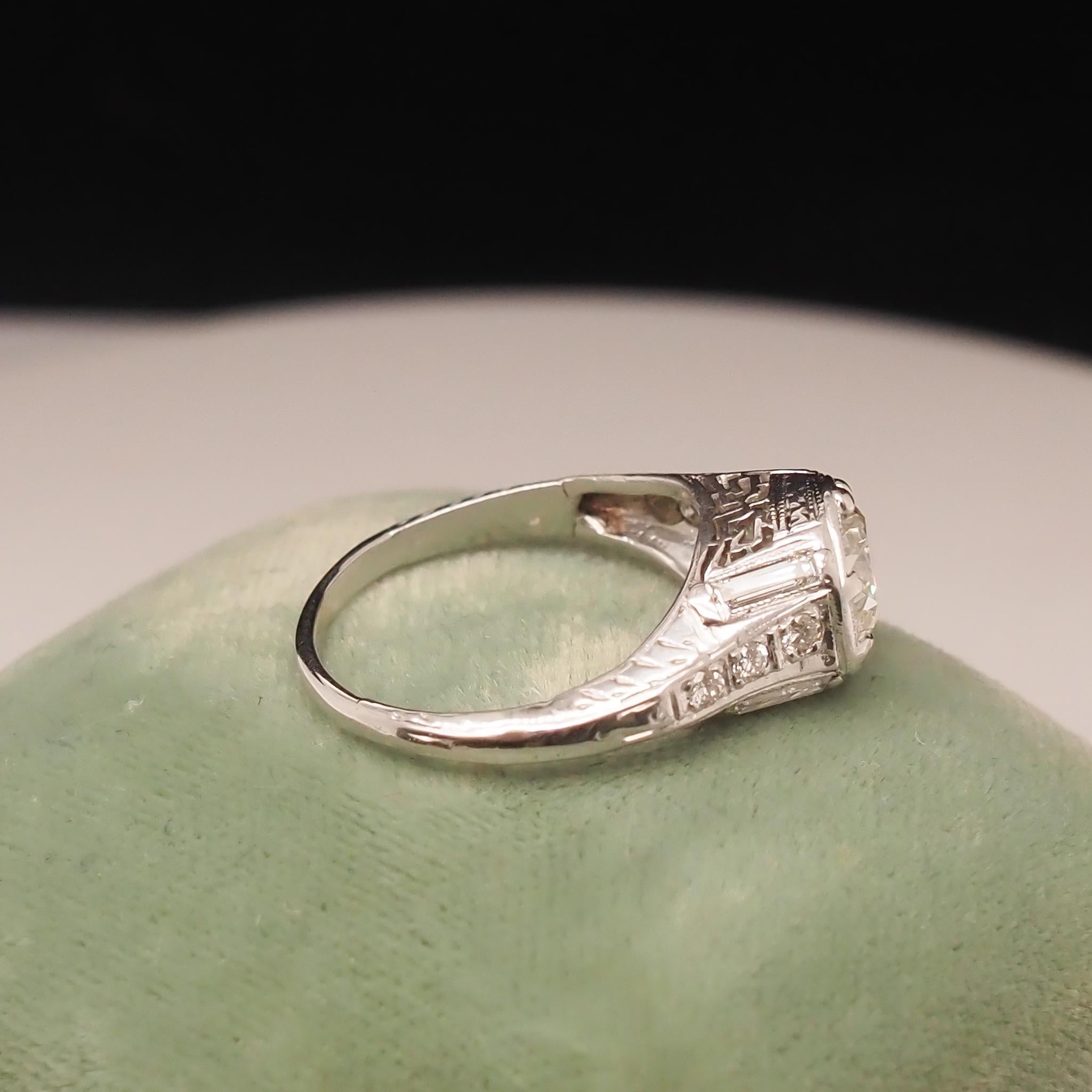 Circa 1920s Art Deco Platinum .90ct Old European Diamond Engagement Ring In Good Condition For Sale In Hicksville, NY