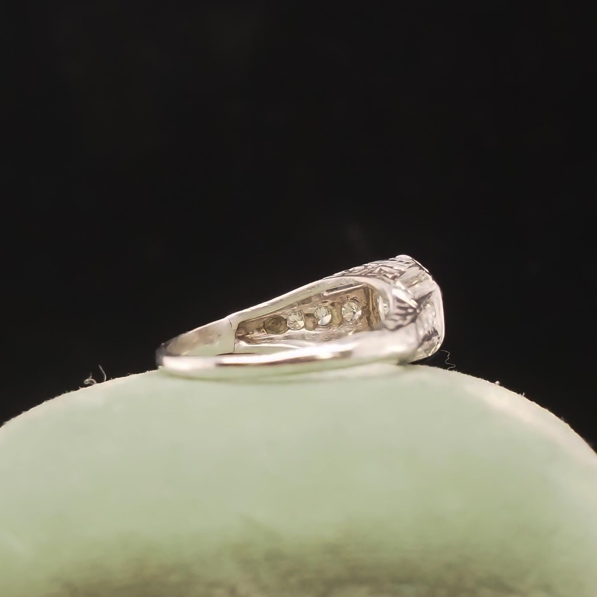Women's Circa 1920s Art Deco Platinum .90ct Old European Diamond Engagement Ring For Sale