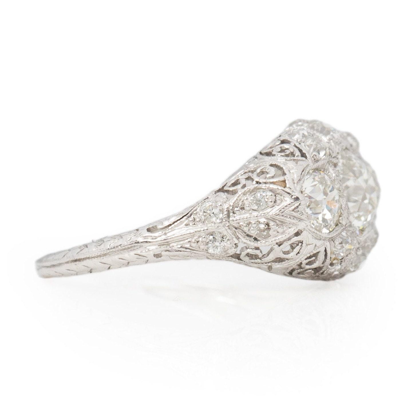 Circa 1920's Art Deco Platinum Filigree Old European Cut 3-Stone Diamond Ring In Good Condition For Sale In Addison, TX
