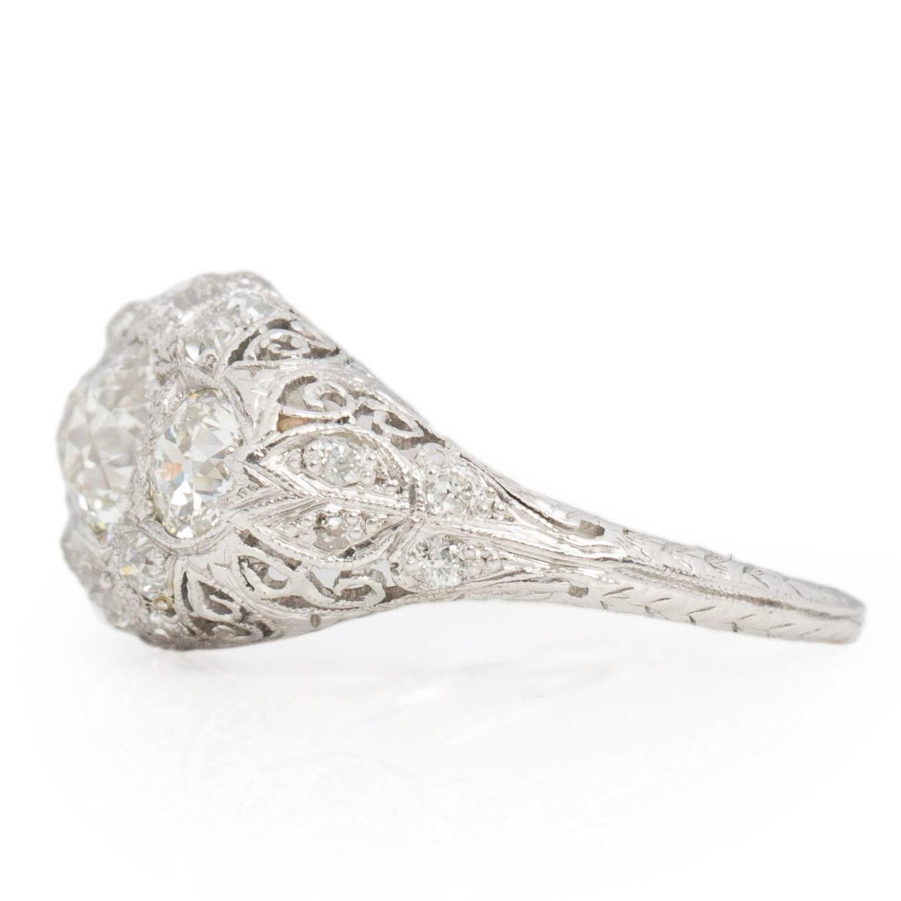 Circa 1920's Art Deco Platinum Filigree Old European Cut 3-Stone Diamond Ring For Sale 1