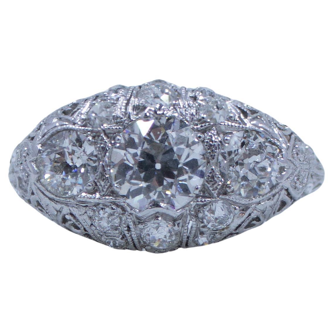 Circa 1920's Art Deco Platinum Filigree Old European Cut 3-Stone Diamond Ring For Sale