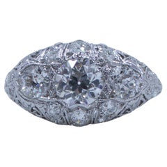 Circa 1920's Art Deco Platinum Filigree Old European Cut 3-Stone Diamond Ring