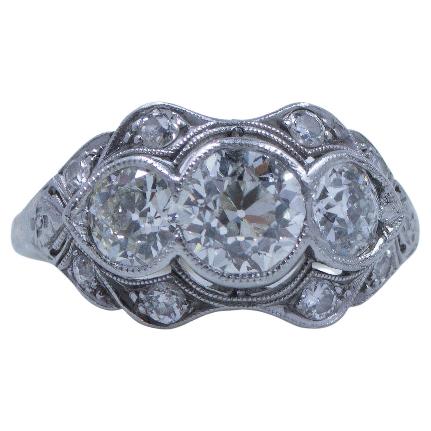 Circa 1920's Art Deco Platinum GIA Certified Three Stone Old European Cut Ring For Sale