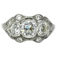 Circa 1920's Art Deco Platinum GIA Certified Three Stone Old European Cut Ring