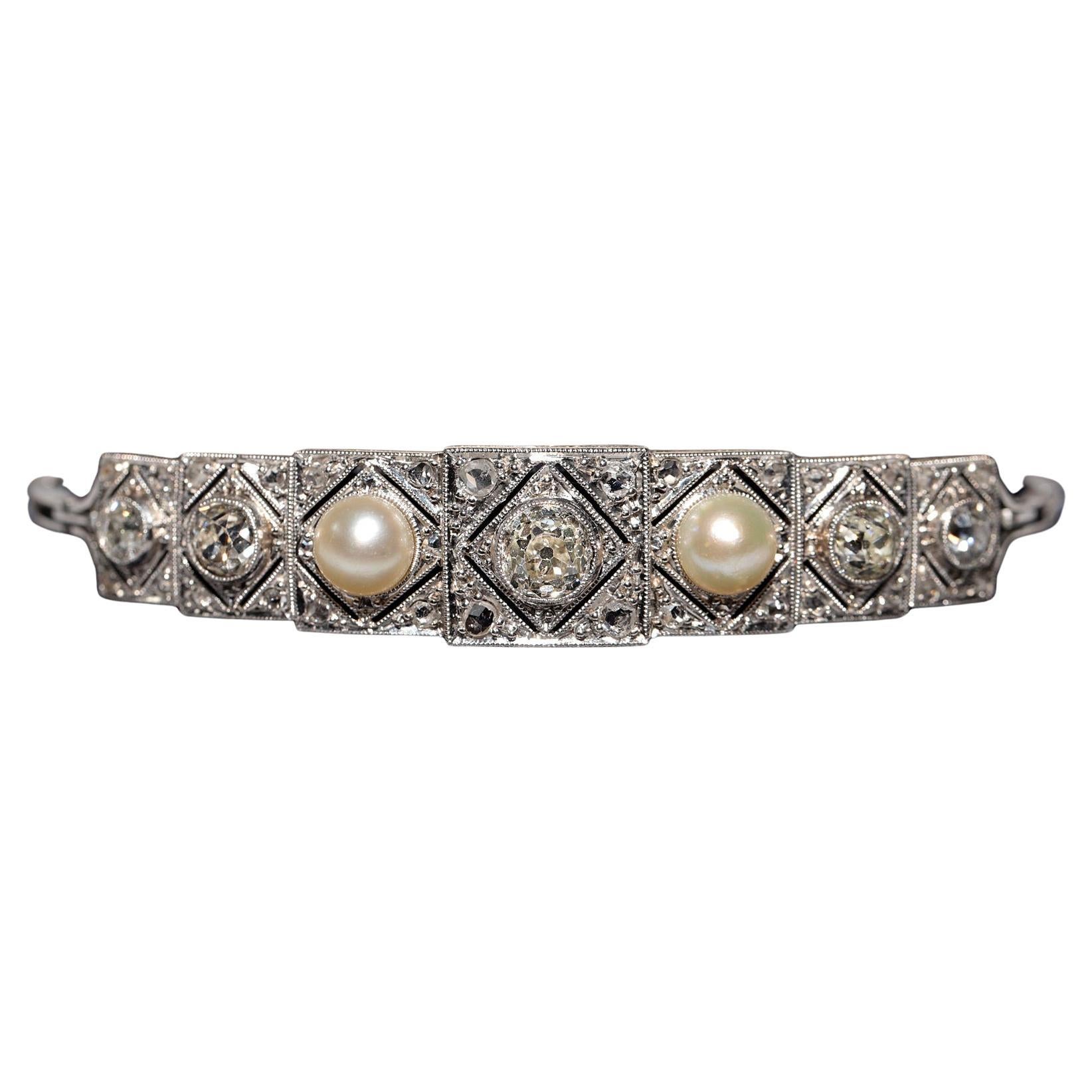 In very good condition.
Total weight is 15.6 grams.
Totally is old cut diamond 2.50 ct.
Total is side rose cut diamond 0.50 ct.
The diamond is has J-K-L color and vs-s1 clarity.
Total lenght is bracelet 16.5 cm.
Box is not included.
Please contact