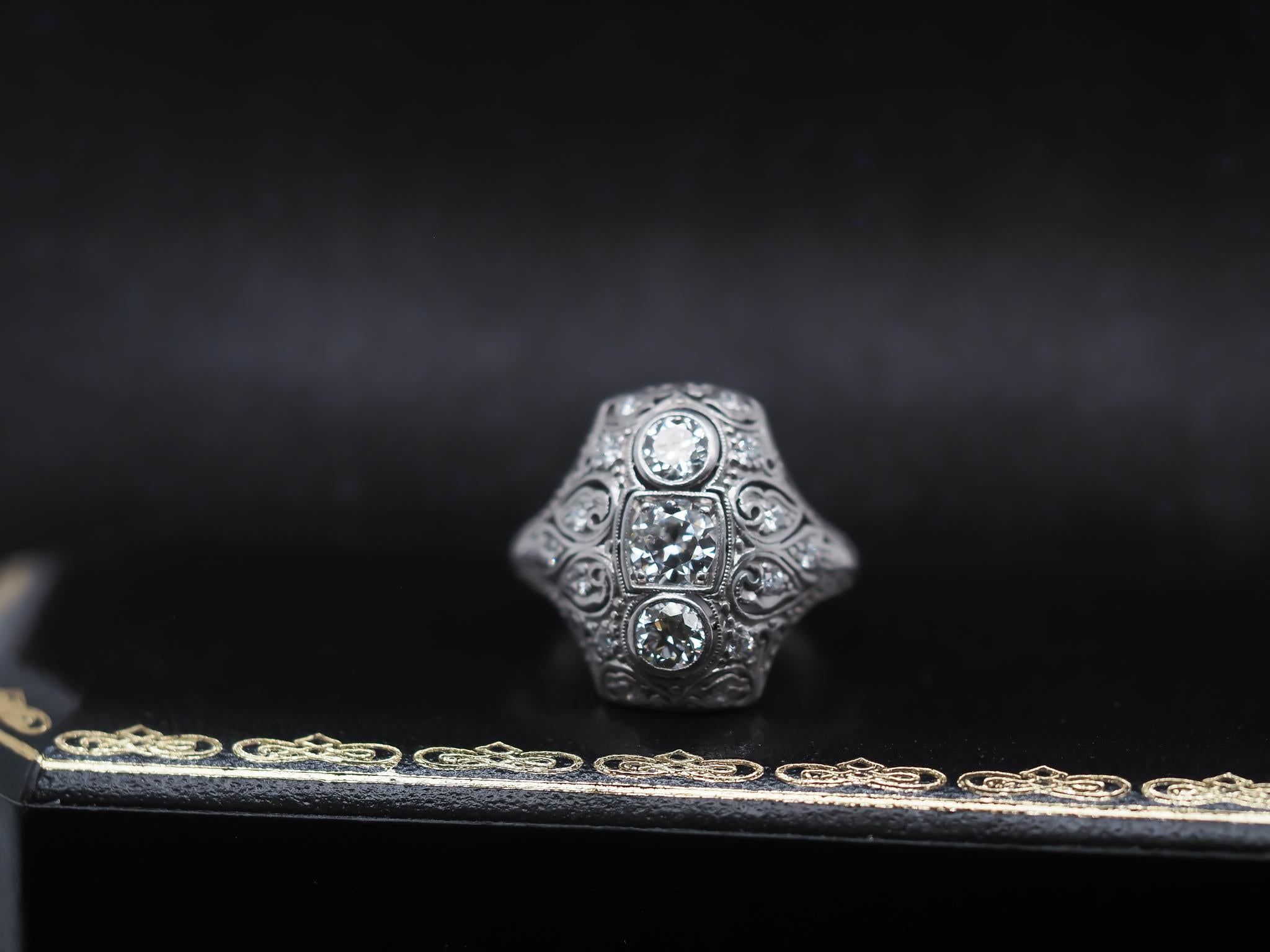 Year: 1920s

Item Details:
Ring Size: 5.5 (Sizable)
Metal Type: Platinum [Hallmarked, and Tested]
Weight: 5.6 grams

Note: Incredible details and engraving work. In pristine condition.

Diamond Details: 1.00ct total weight, Old European Brilliant, F