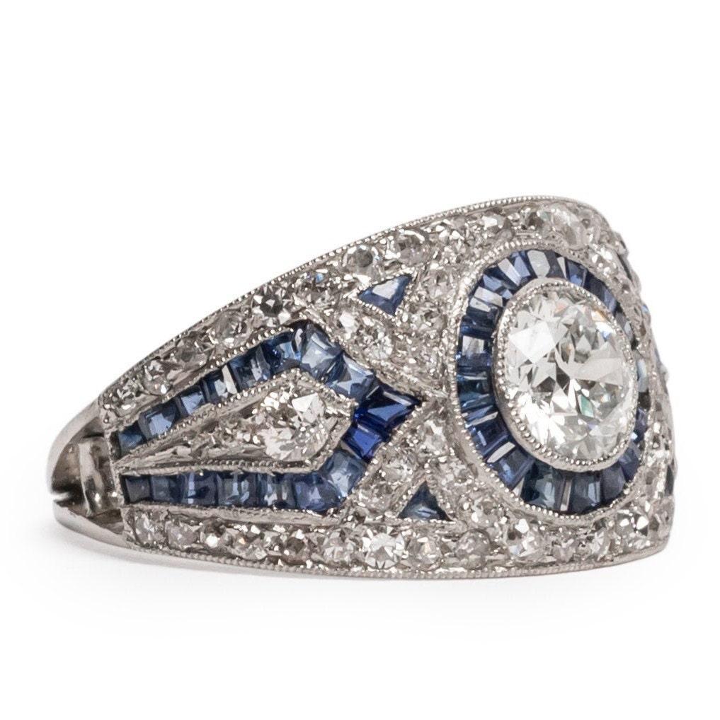 Old European Cut Circa 1920's Art Deco Platinum Pave Diamond and Blue Sapphire Ring For Sale
