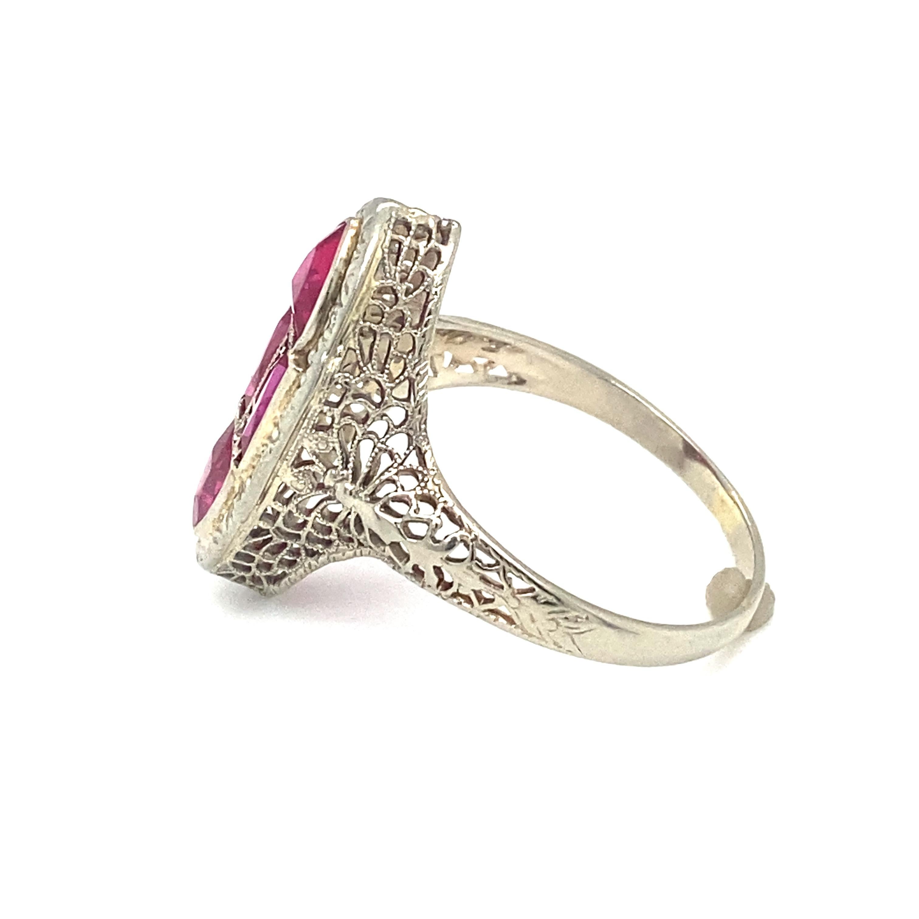 Baguette Cut Circa 1920s Art Deco Simulated Ruby Cocktail Ring in 14 Karat White Gold For Sale