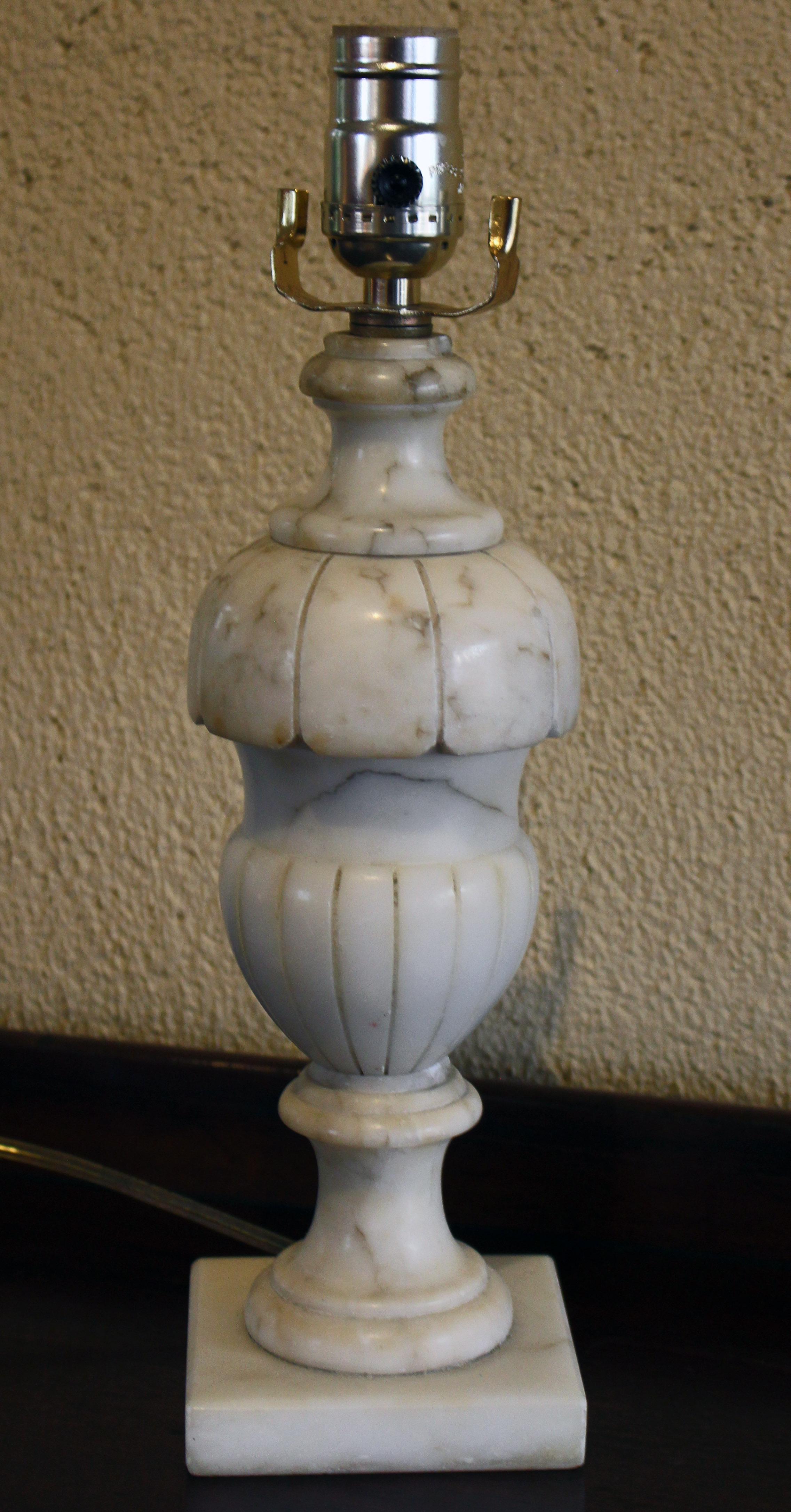 Circa 1920s carved alabaster lamp of Classical form with gadroon motifs. 21 1/4