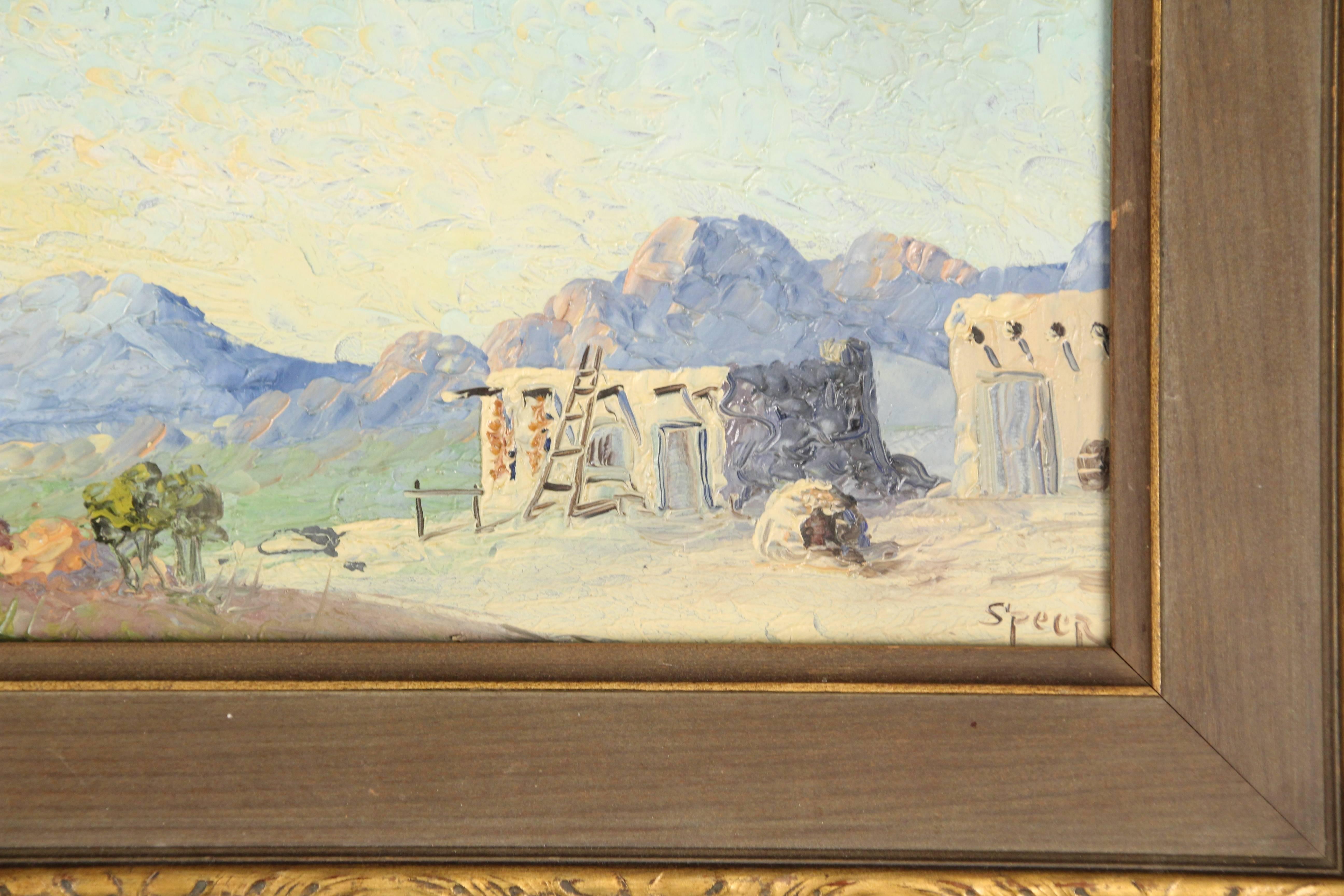Attractive 1920s desert oil painting depicting desert landscape with adobe buildings, signed Speer.