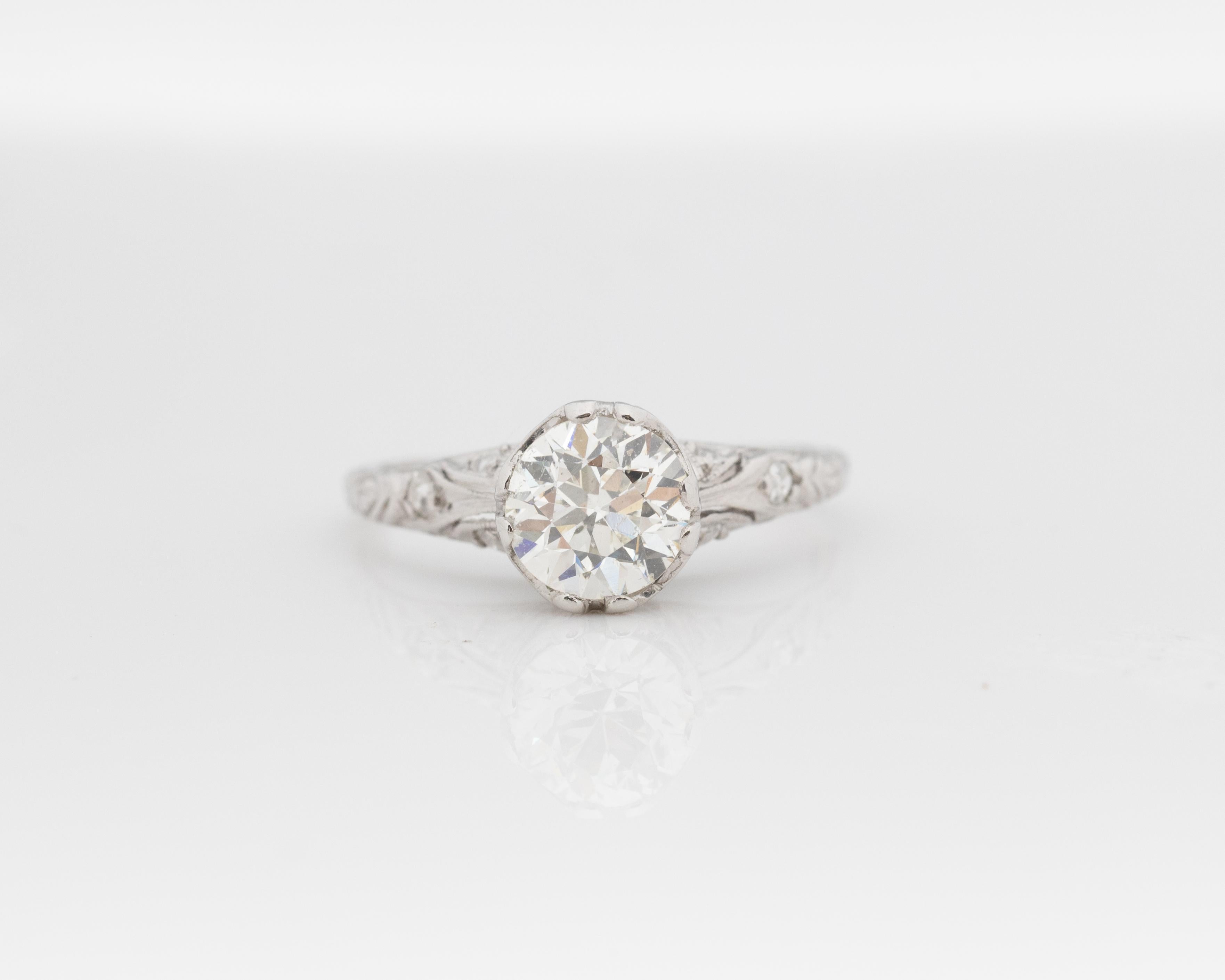 Year: 1920s
Item Details:
Ring Size: 5.75
Metal Type: Platinum [Hallmarked, and Tested]
Weight: 3.4 grams
Center Diamond Details:
GIA Report#: 2235302811
Weight: 1.12ct total weight
Cut: Old European brilliant
Color: L
Clarity: SI
Type: