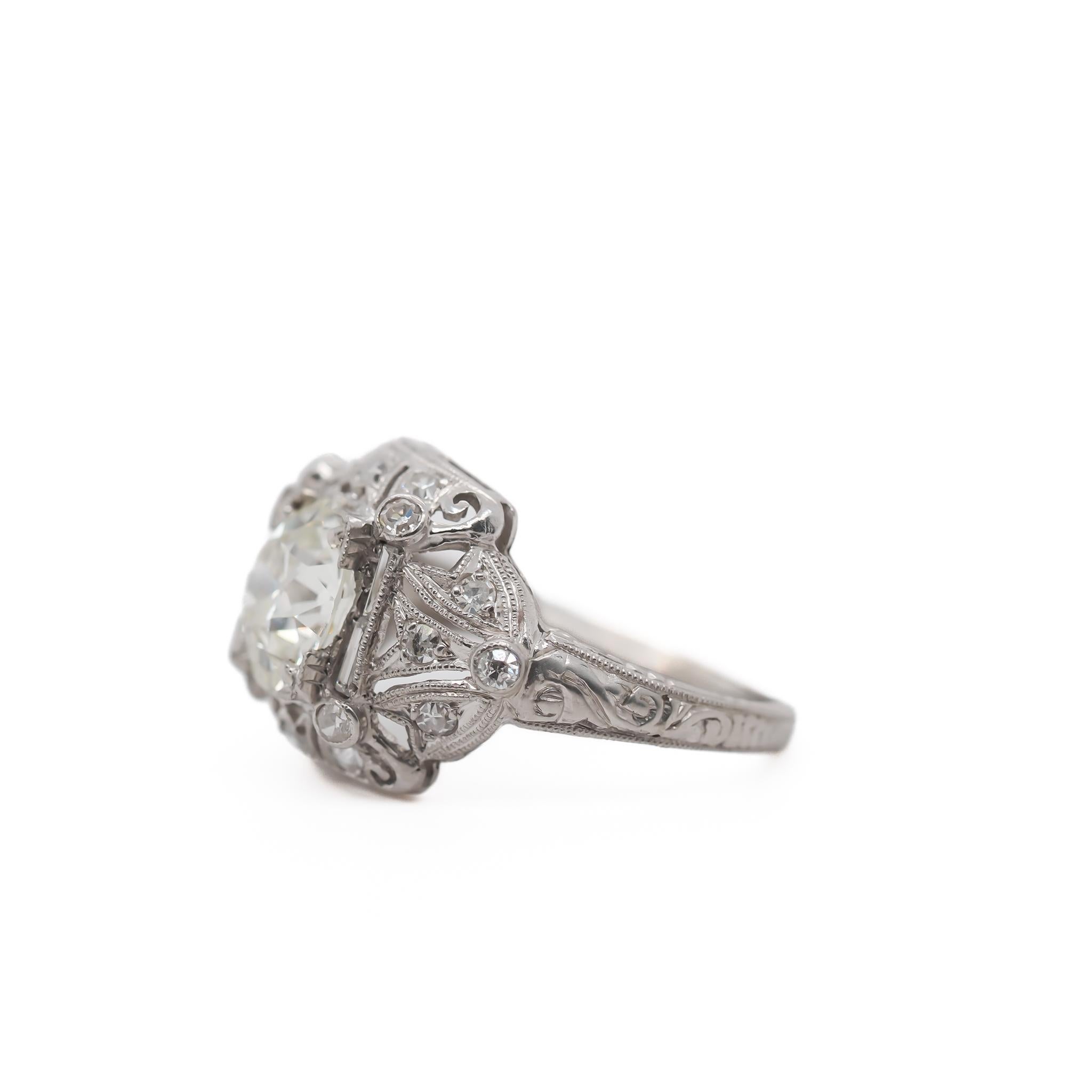 Year: 1920s

Item Details:
Ring Size: 5
Metal Type: Platinum   [Hallmarked, and Tested]
Weight: 4.9 grams

Center Diamond Details:

GIA Report#:6234413471
Weight: 1.67ct total weight
Cut: Old European brilliant
Color: M
Clarity: SI2
Type: