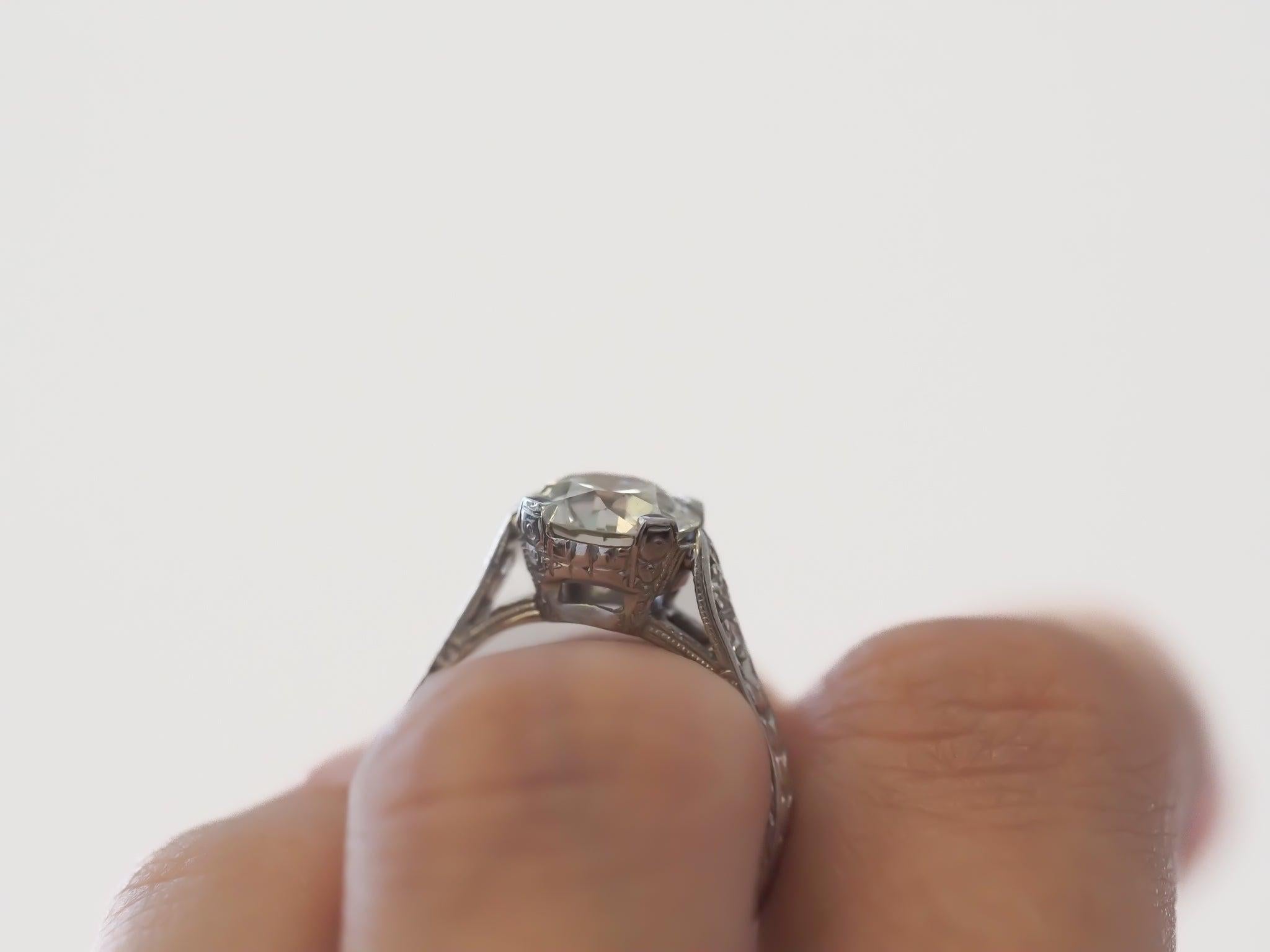 Year: 1920s
Item Details:
Ring Size: 4.5
Metal Type: Platinum [Hallmarked, and Tested]
Weight: 2.9 grams
Center Diamond Details:
GIA Report#:72353224907
Weight: 1.70ct total weight
Cut: Old European brilliant
Color: J
Clarity: SI1
Type: