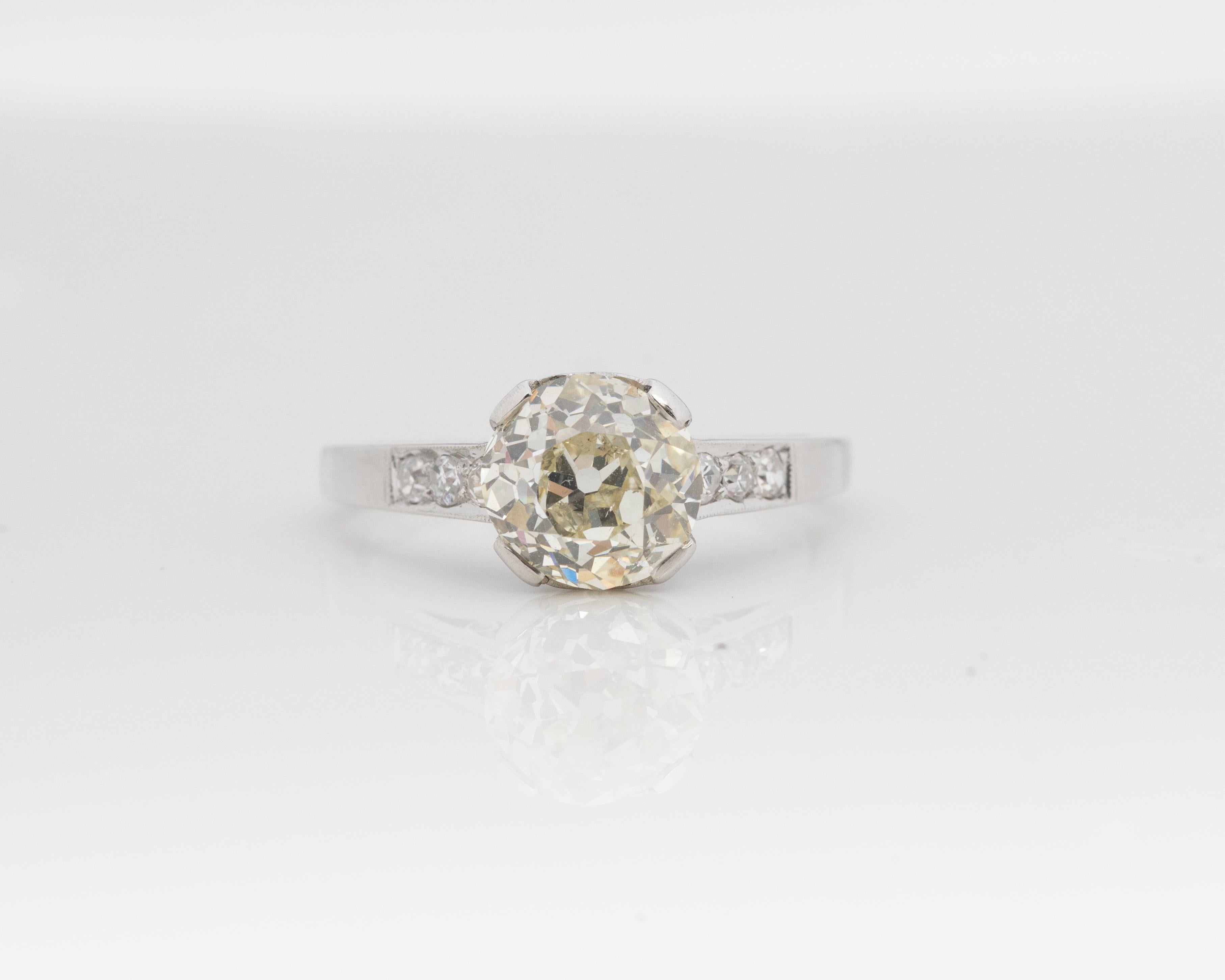 Year: 1920s
Item Details:
Ring Size: 6
Metal Type: Platinum [Hallmarked, and Tested]
Weight: 4.0 grams
Center Diamond Details:
GIA Report#: 623757385
Weight: 2.04ct total weight
Cut: Old European brilliant
Color: O/P
Clarity: SI1
Type: