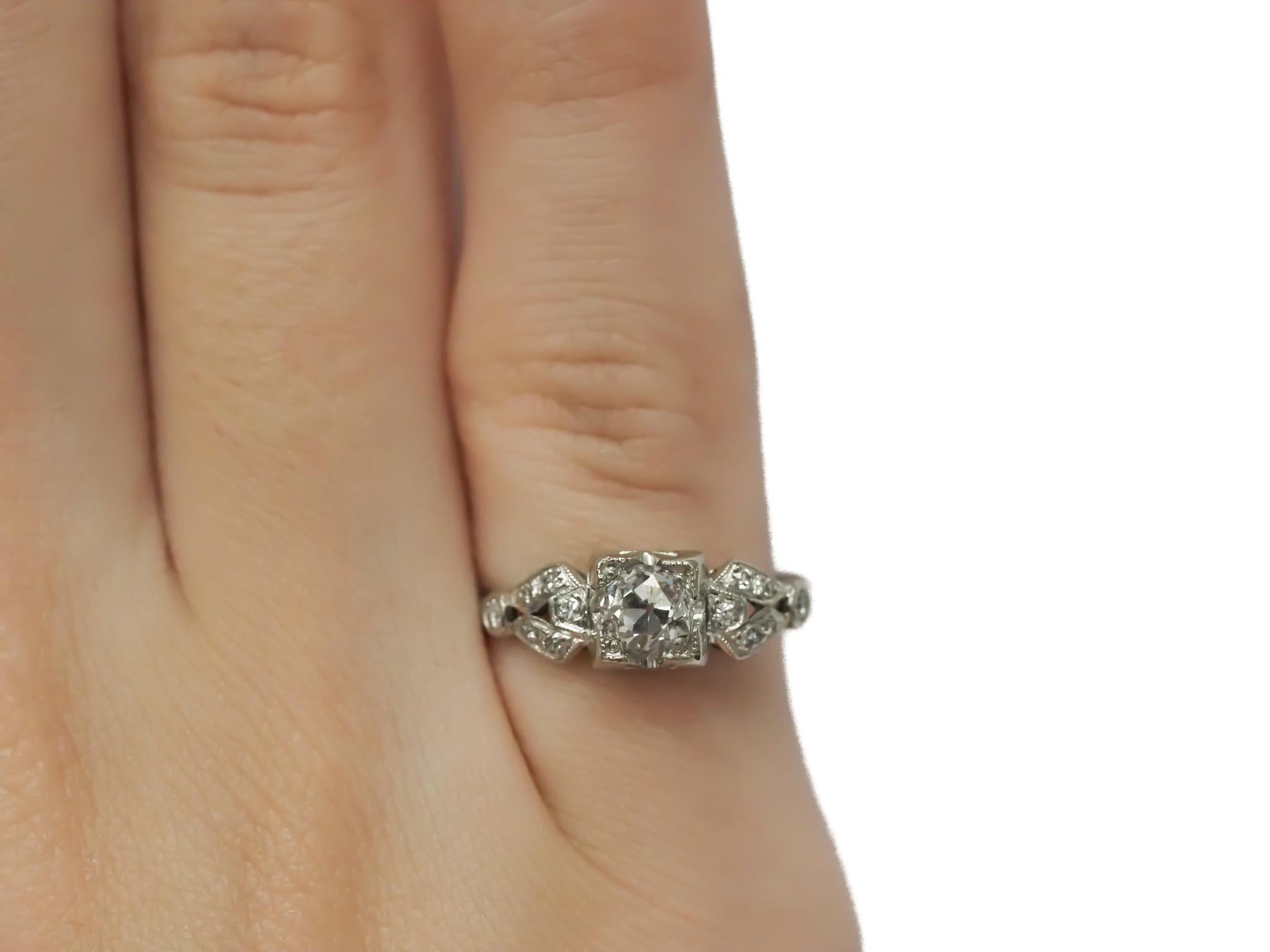Circa 1920s GIA .55ct Old European Diamond Platinum Engagement Ring In Good Condition For Sale In Hicksville, NY