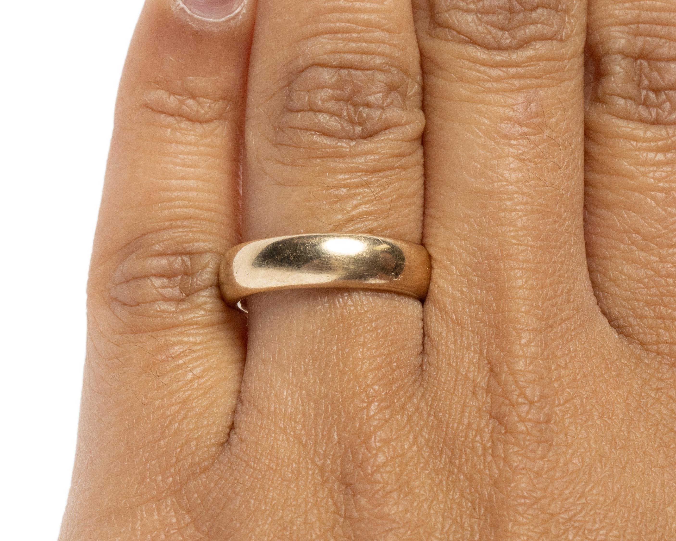 Here we have a beautiful unisex wedding band, a true classic. Crafted in 18K Yellow Gold this band has some heft, with a smooth finish. Perfect as a  addition to help you say 