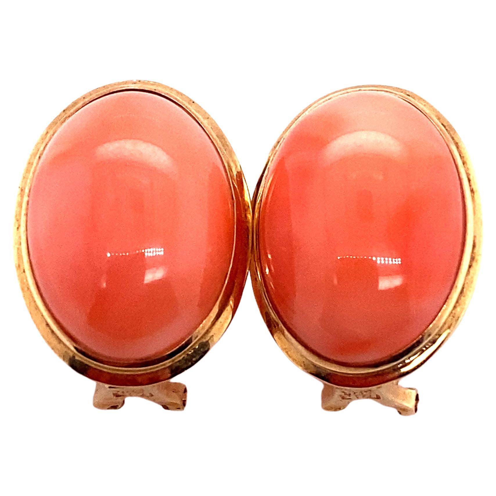 Circa 1920s Oval Orange Coral Button Earrings in 14 Karat Gold For Sale